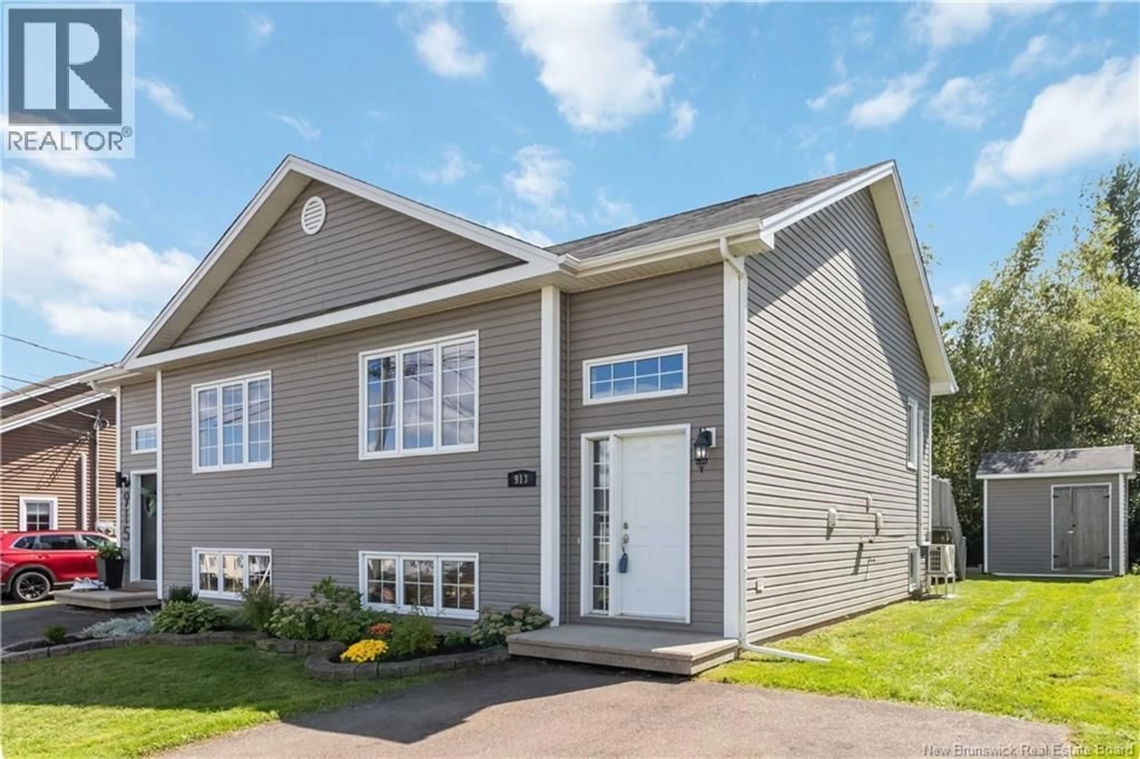Home with vinyl exterior material, street for 913 BERNARD STREET, Dieppe New Brunswick E1A4A6