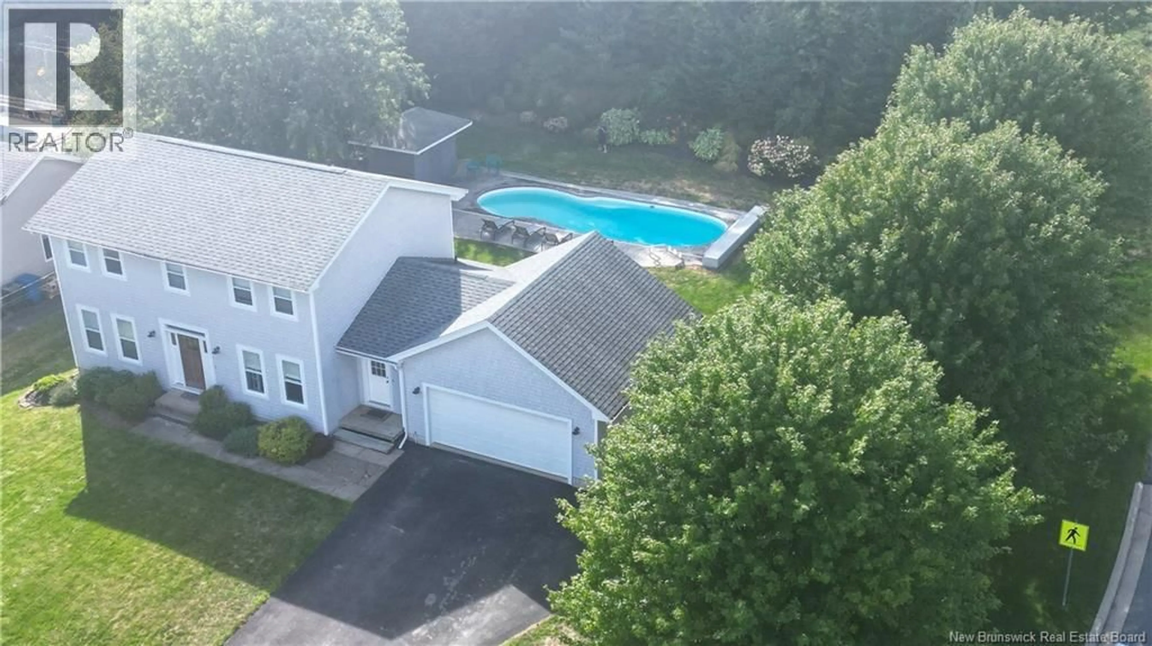 A pic from outside/outdoor area/front of a property/back of a property/a pic from drone, water/lake/river/ocean view for 91 QUEENSBURY DRIVE, Quispamsis New Brunswick E2E5Y7