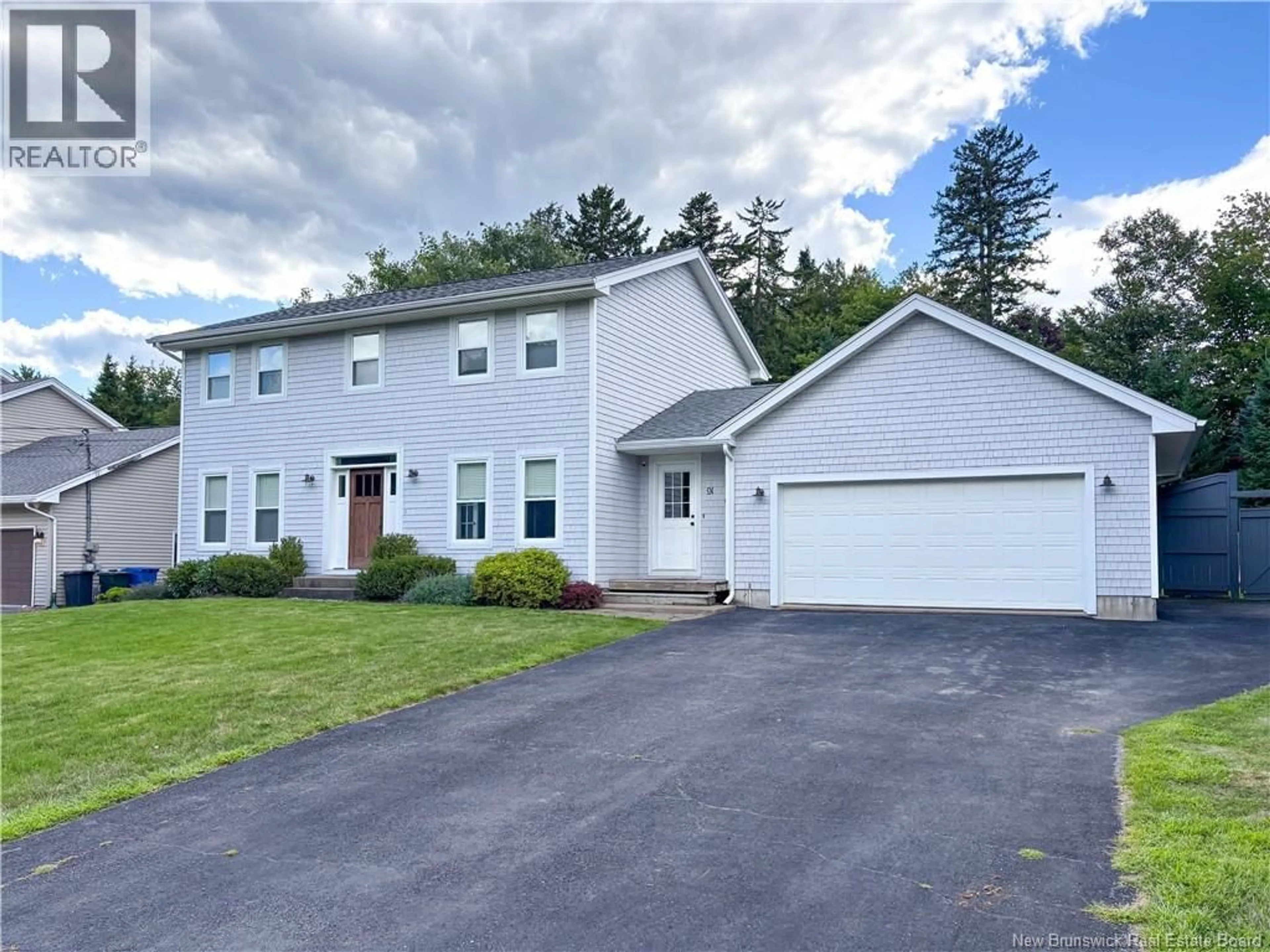 Home with vinyl exterior material, street for 91 QUEENSBURY DRIVE, Quispamsis New Brunswick E2E5Y7