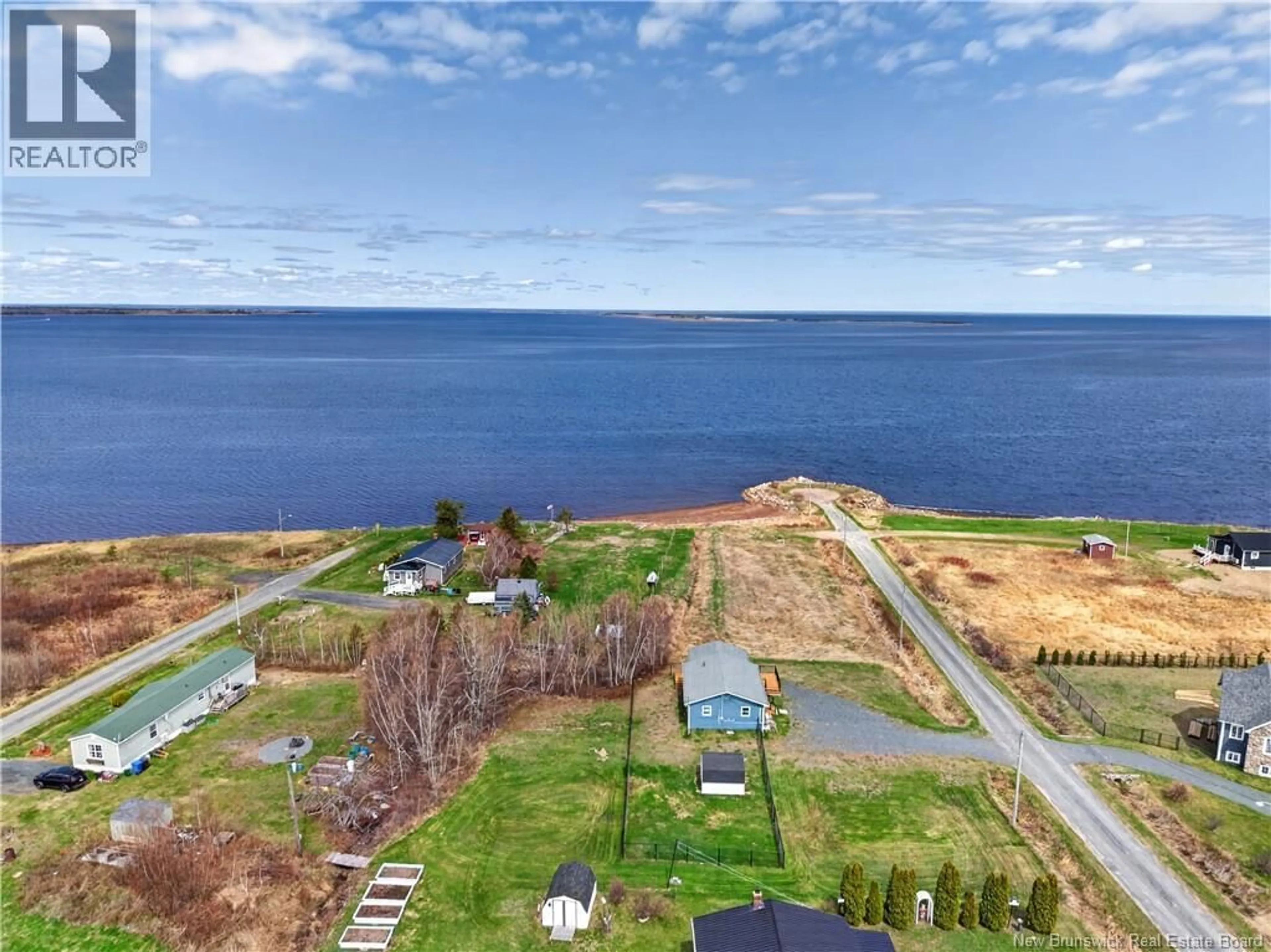 A pic from outside/outdoor area/front of a property/back of a property/a pic from drone, water/lake/river/ocean view for 17 NORTH BAYVIEW ROAD, Baie-Sainte-Anne New Brunswick E9A1A2