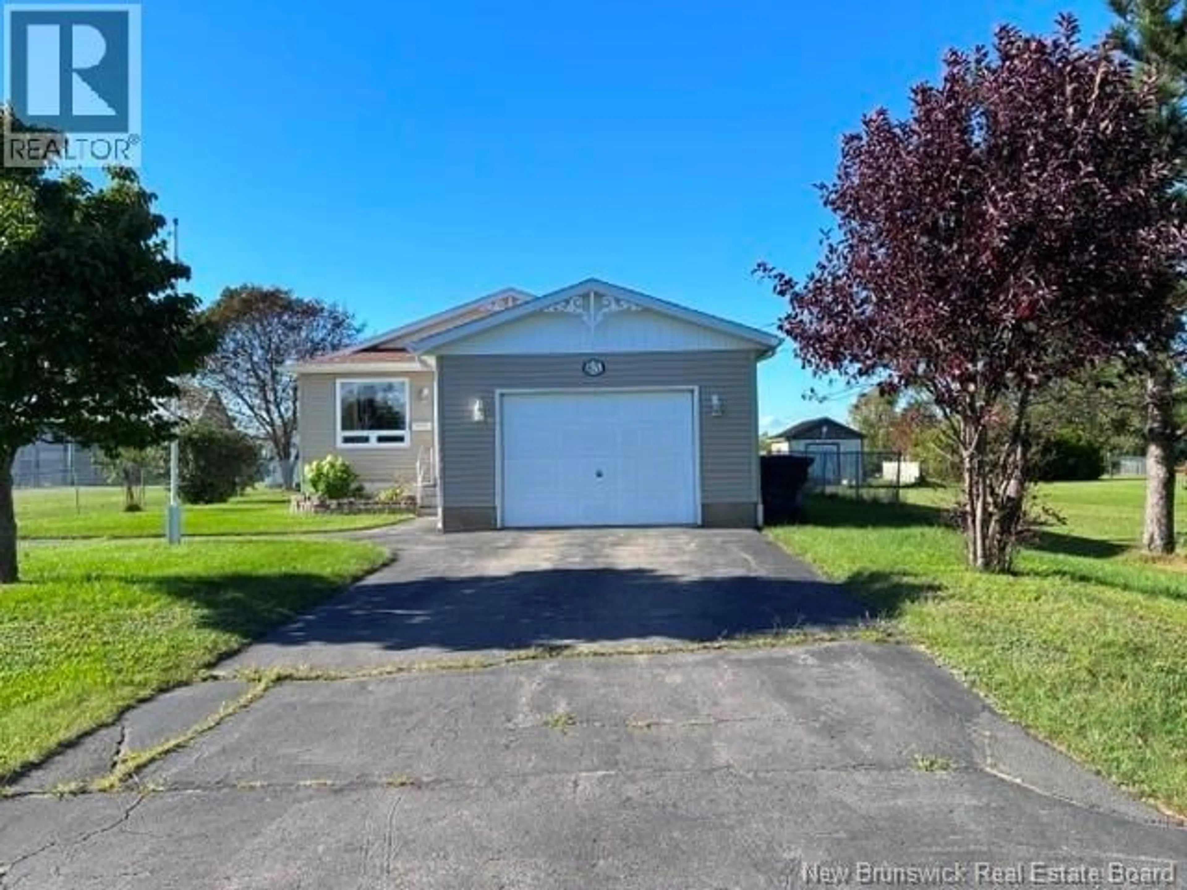 Home with vinyl exterior material, street for 63 PARISE STREET, Caraquet New Brunswick E1W1B6