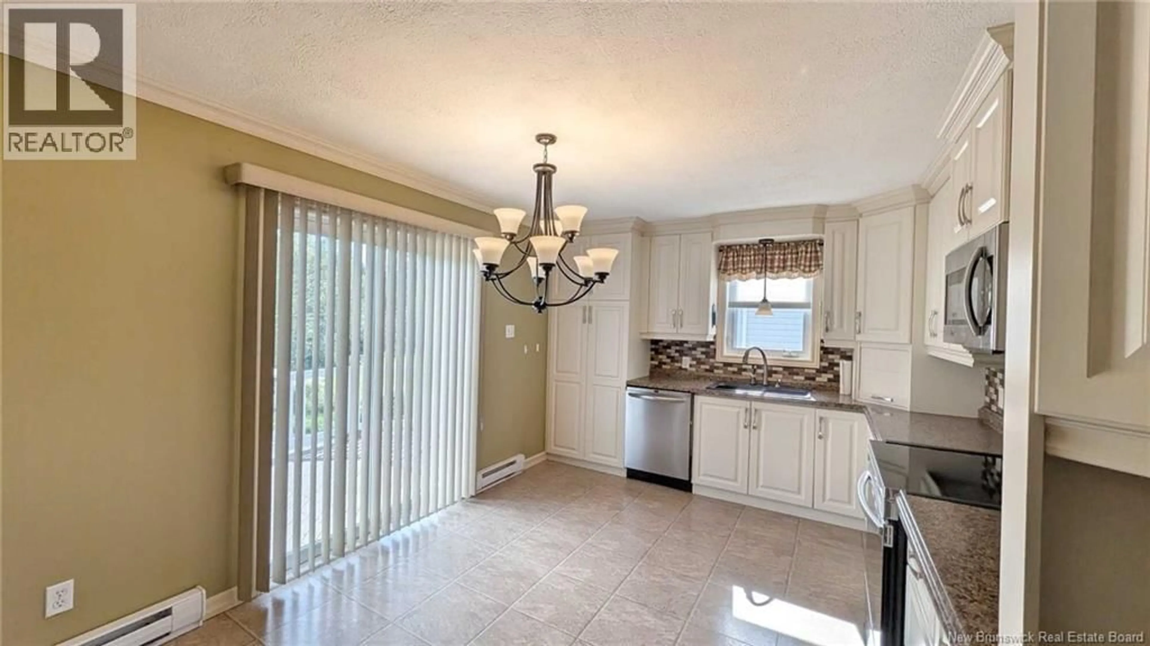Open concept kitchen, ceramic/tile floor for 183 LANDRY STREET, Beresford New Brunswick E8K1G9
