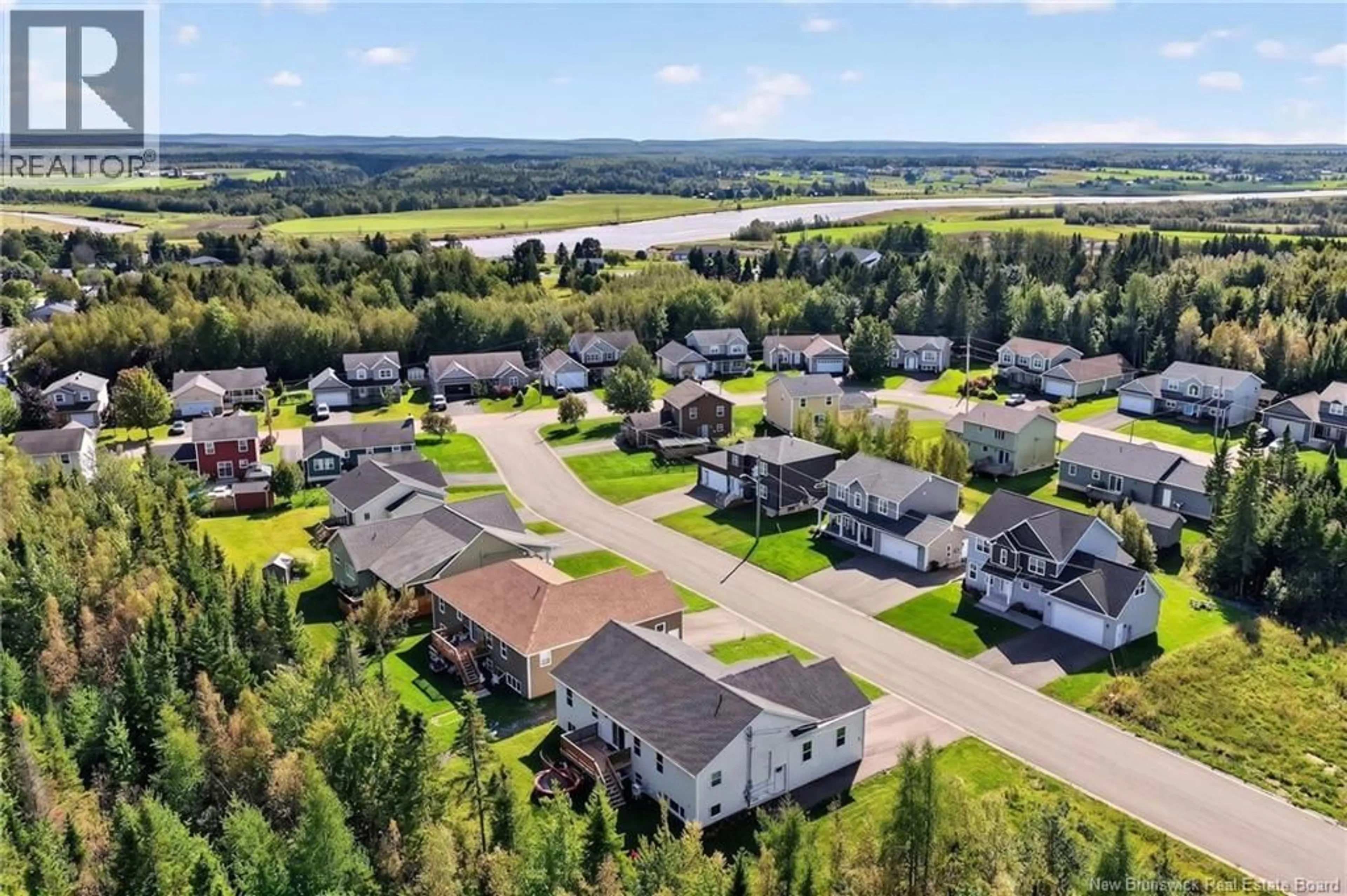 A pic from outside/outdoor area/front of a property/back of a property/a pic from drone, water/lake/river/ocean view for 27 SYCAMORE, Moncton New Brunswick E1E0K1