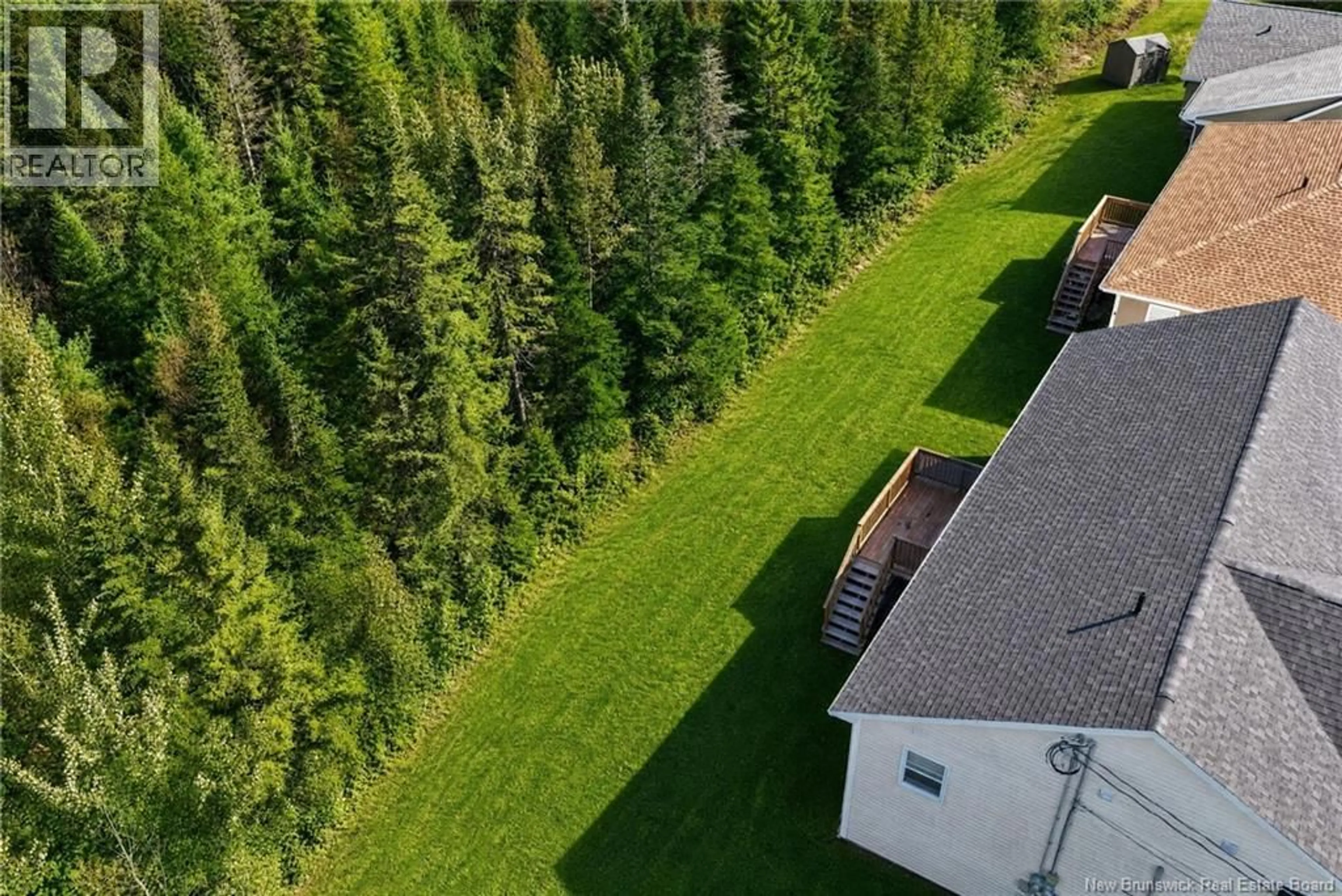 A pic from outside/outdoor area/front of a property/back of a property/a pic from drone, forest/trees view for 27 SYCAMORE, Moncton New Brunswick E1E0K1