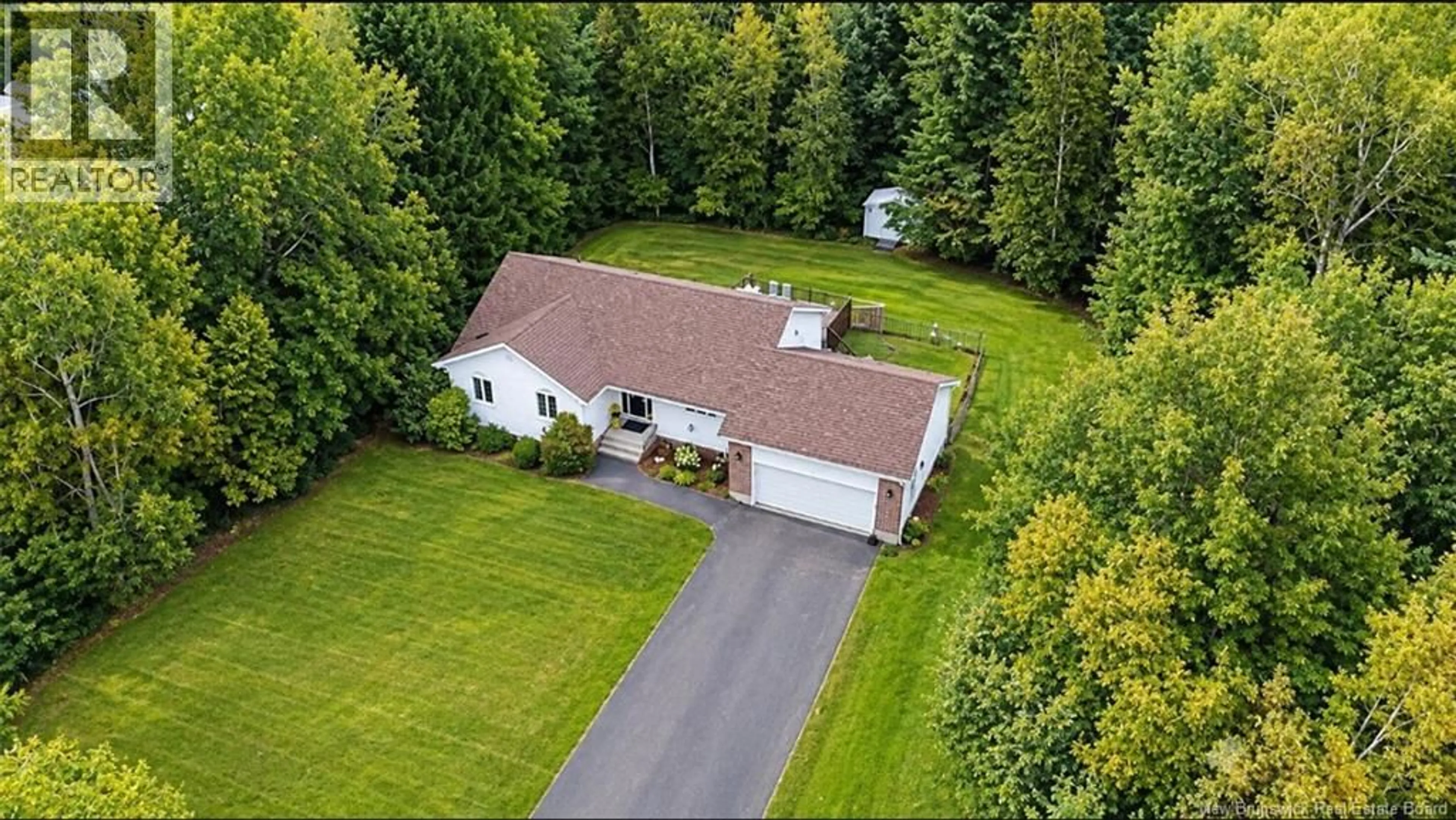 A pic from outside/outdoor area/front of a property/back of a property/a pic from drone, street for 25 ROCKWOOD WAY, Richibucto Road New Brunswick E3A6X5