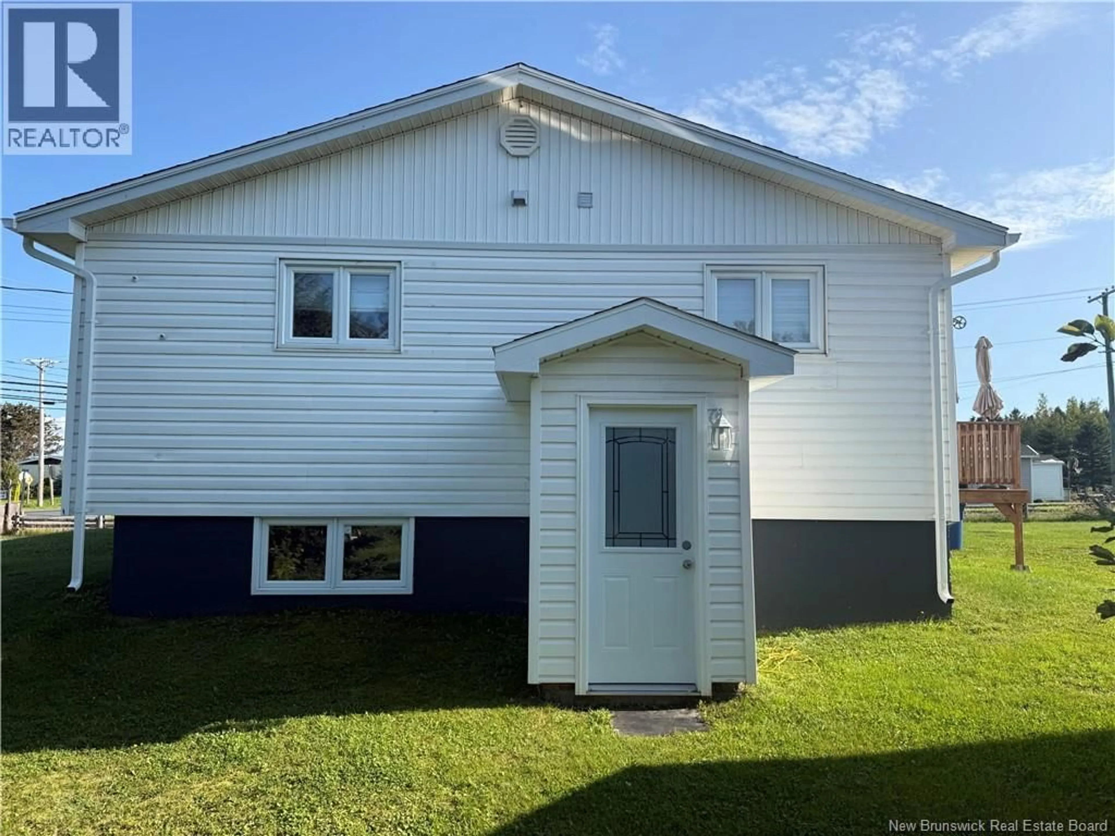 Home with vinyl exterior material, street for 1010 ROUTE 134, Petit-Rocher New Brunswick E8J1A1