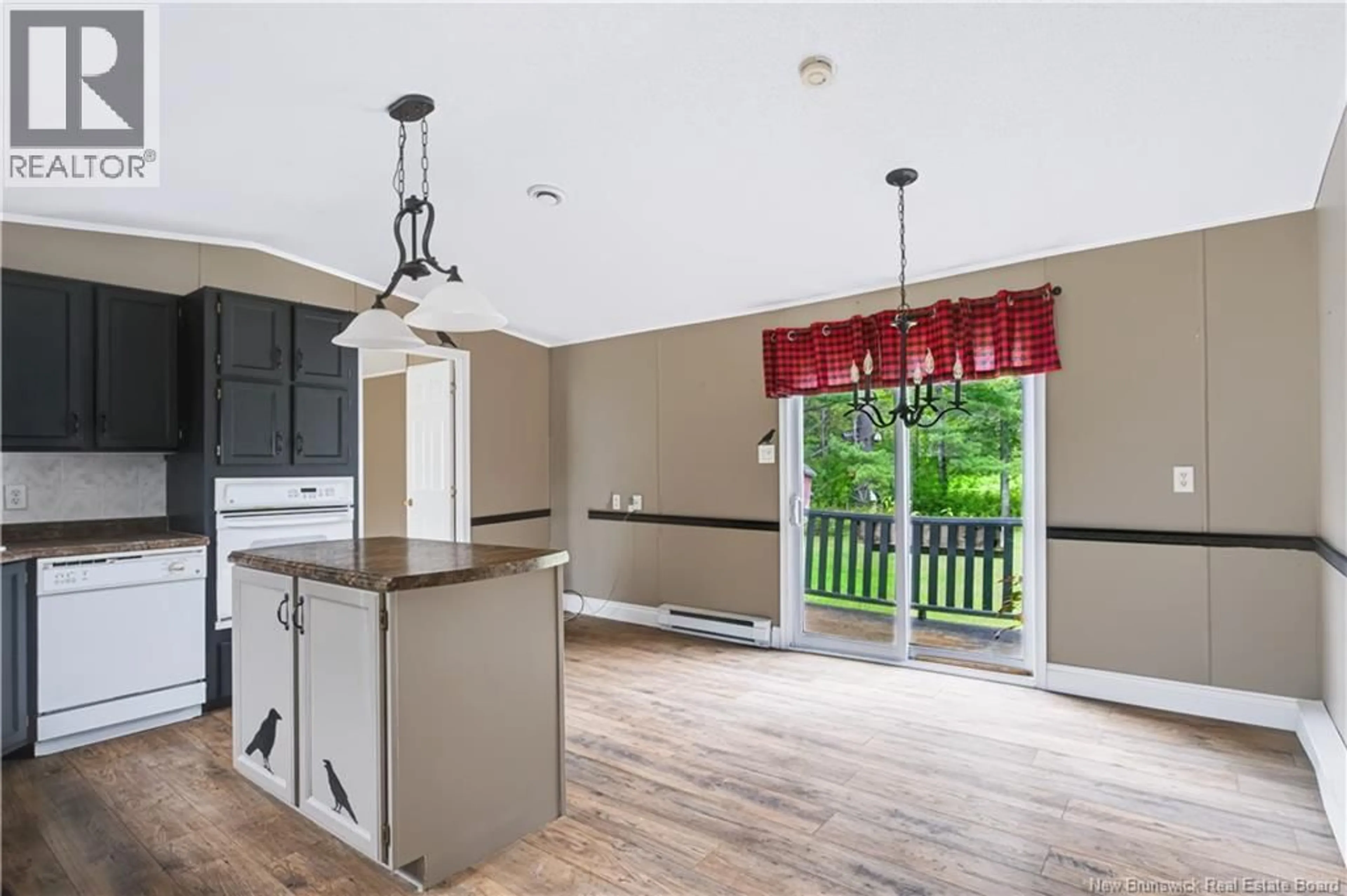 Open concept kitchen, wood/laminate floor for 9 CRAB TREE LANE, Maugerville New Brunswick E3A9W4