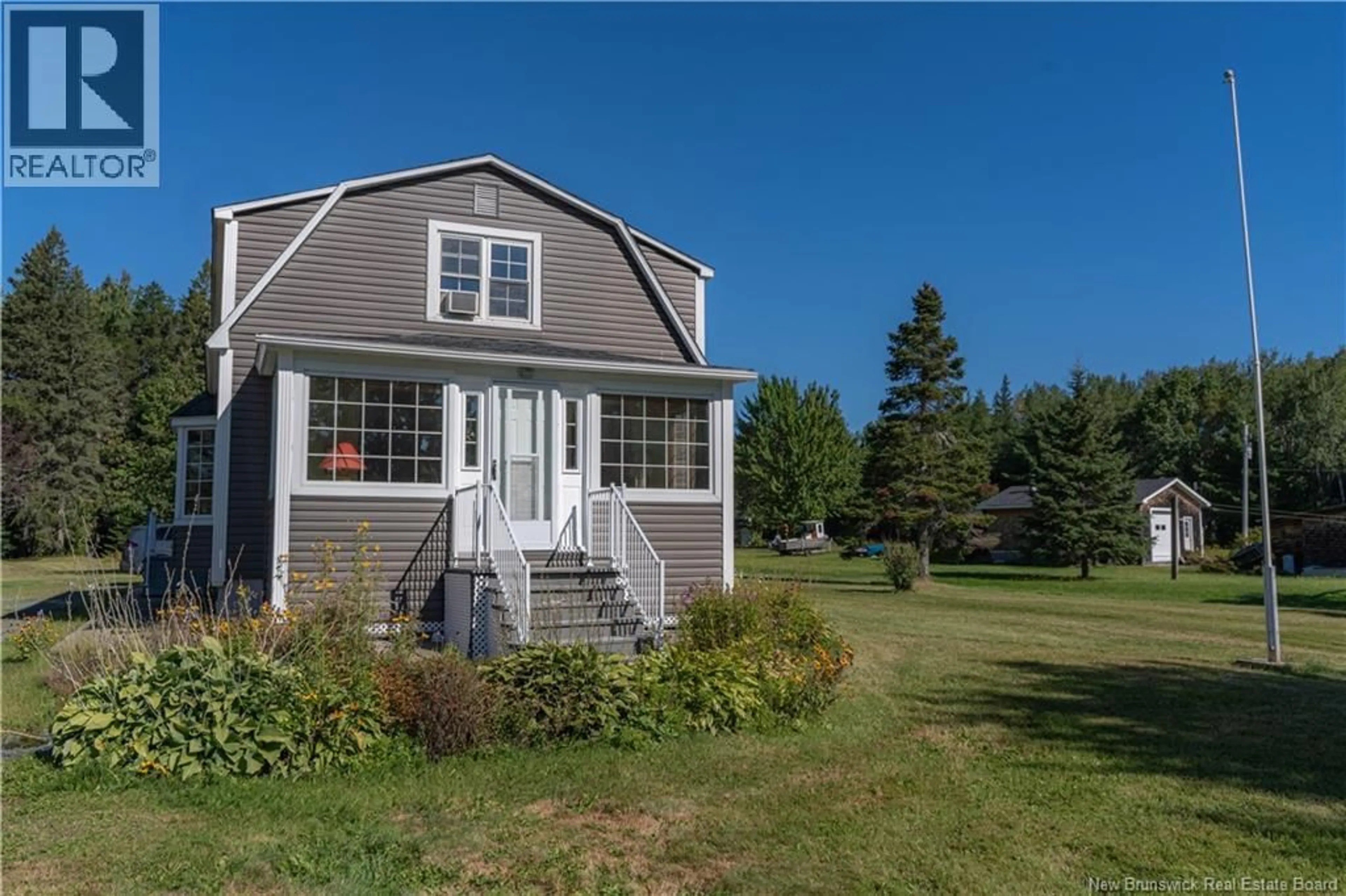 Home with vinyl exterior material, street for 743 RTE 11, Bartibog Bridge New Brunswick E1V7H7