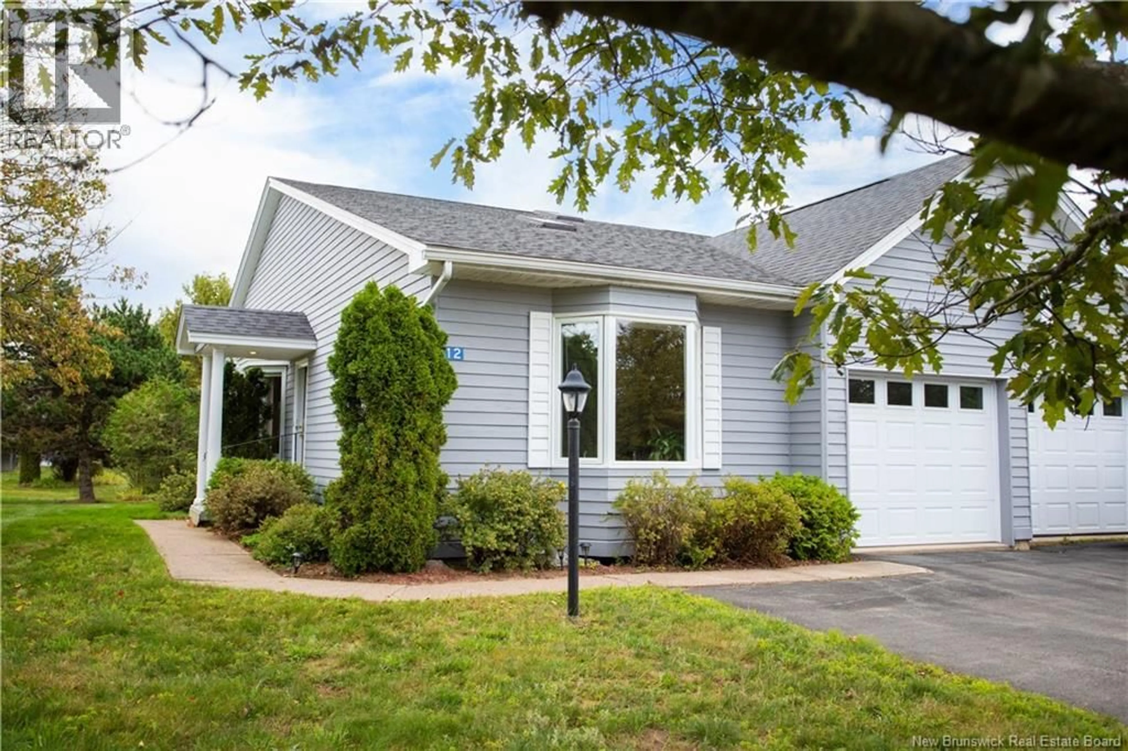 Home with vinyl exterior material, street for 12 WINDERMERE COURT, Rothesay New Brunswick E2E5Y4