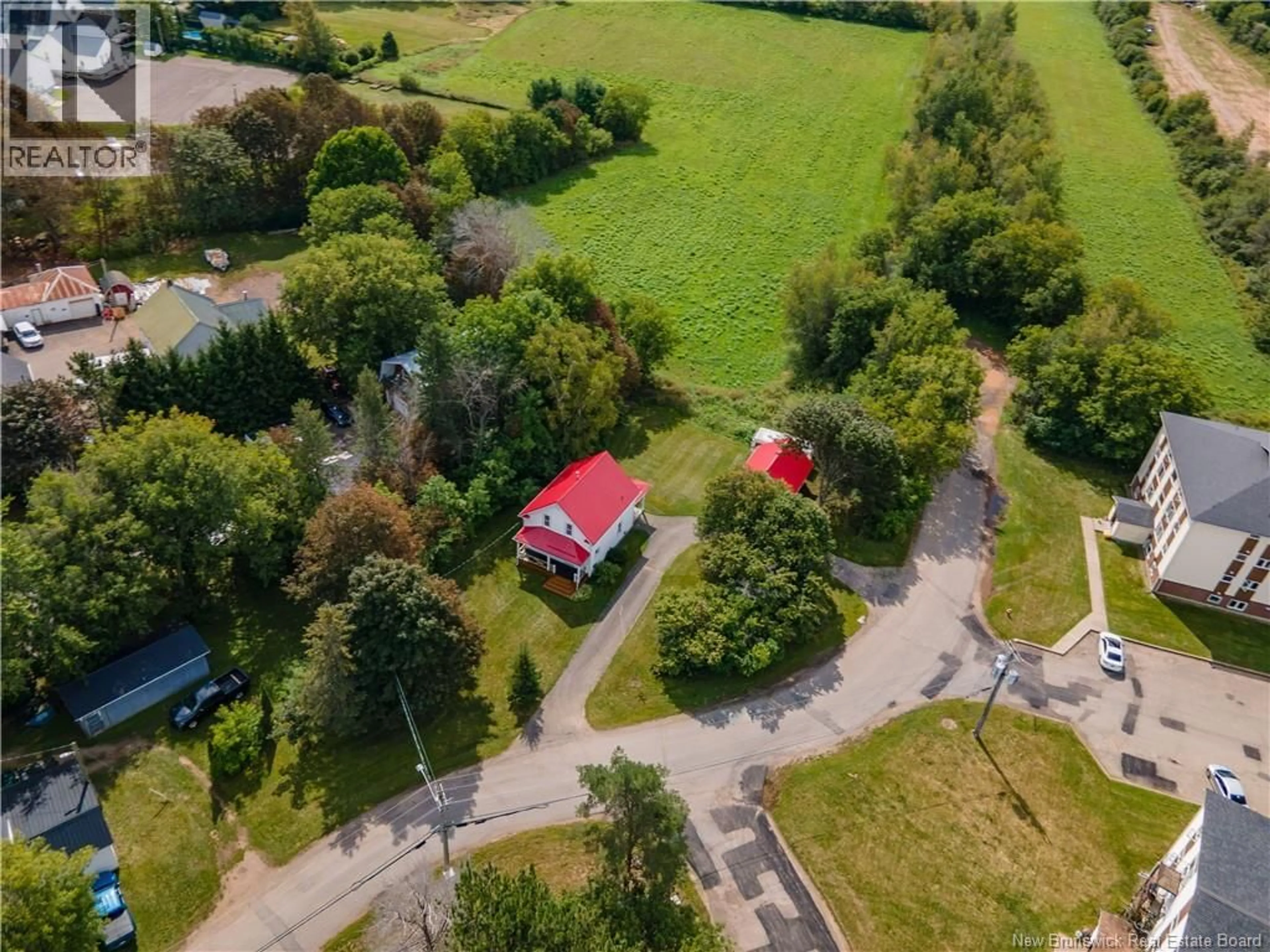 A pic from outside/outdoor area/front of a property/back of a property/a pic from drone, street for 6 GREEN VALLEY, Sussex Corner New Brunswick E4E3B5