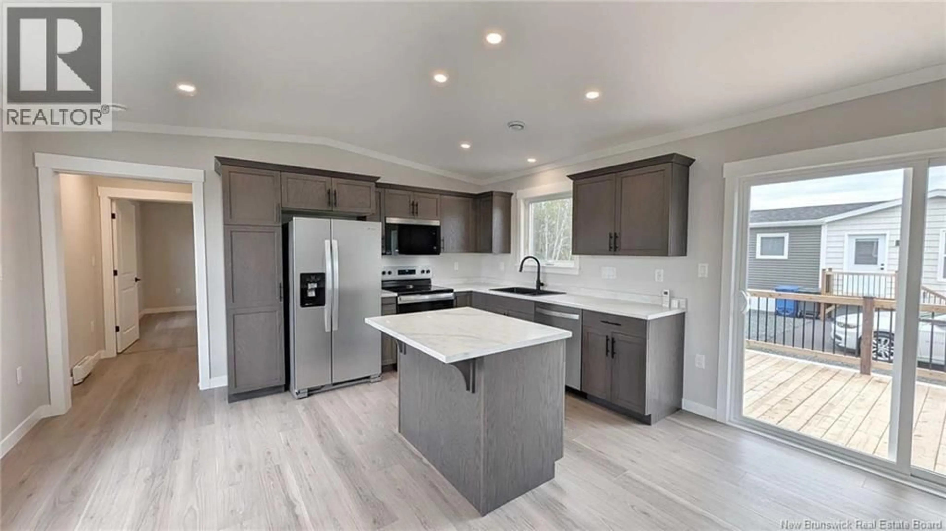 Open concept kitchen, ceramic/tile floor for 231 RUE BELLA VISTA, Tracadie New Brunswick E1X4W1