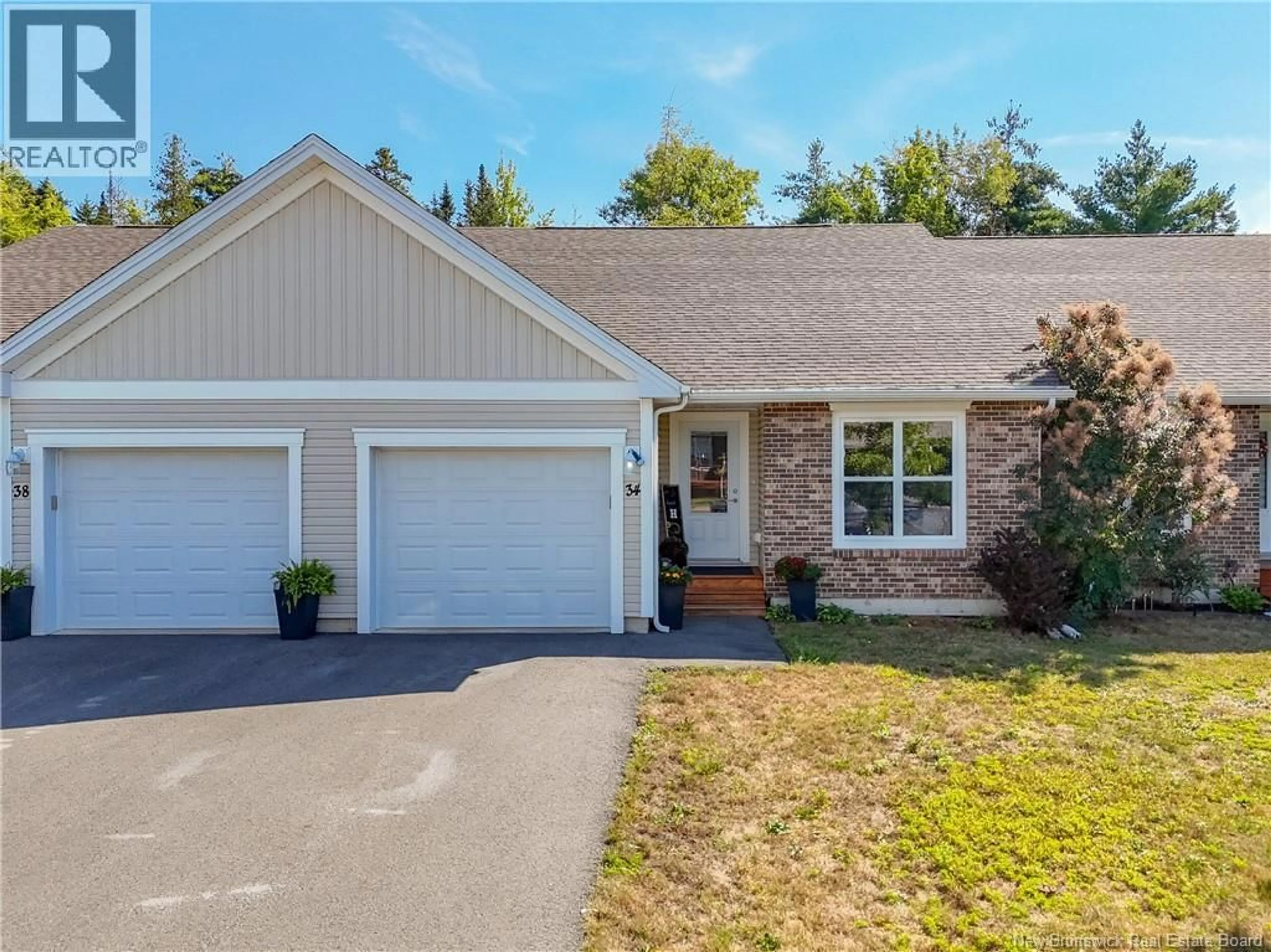 Home with vinyl exterior material, street for 34 CARDING WAY, Fredericton New Brunswick E3A5X5