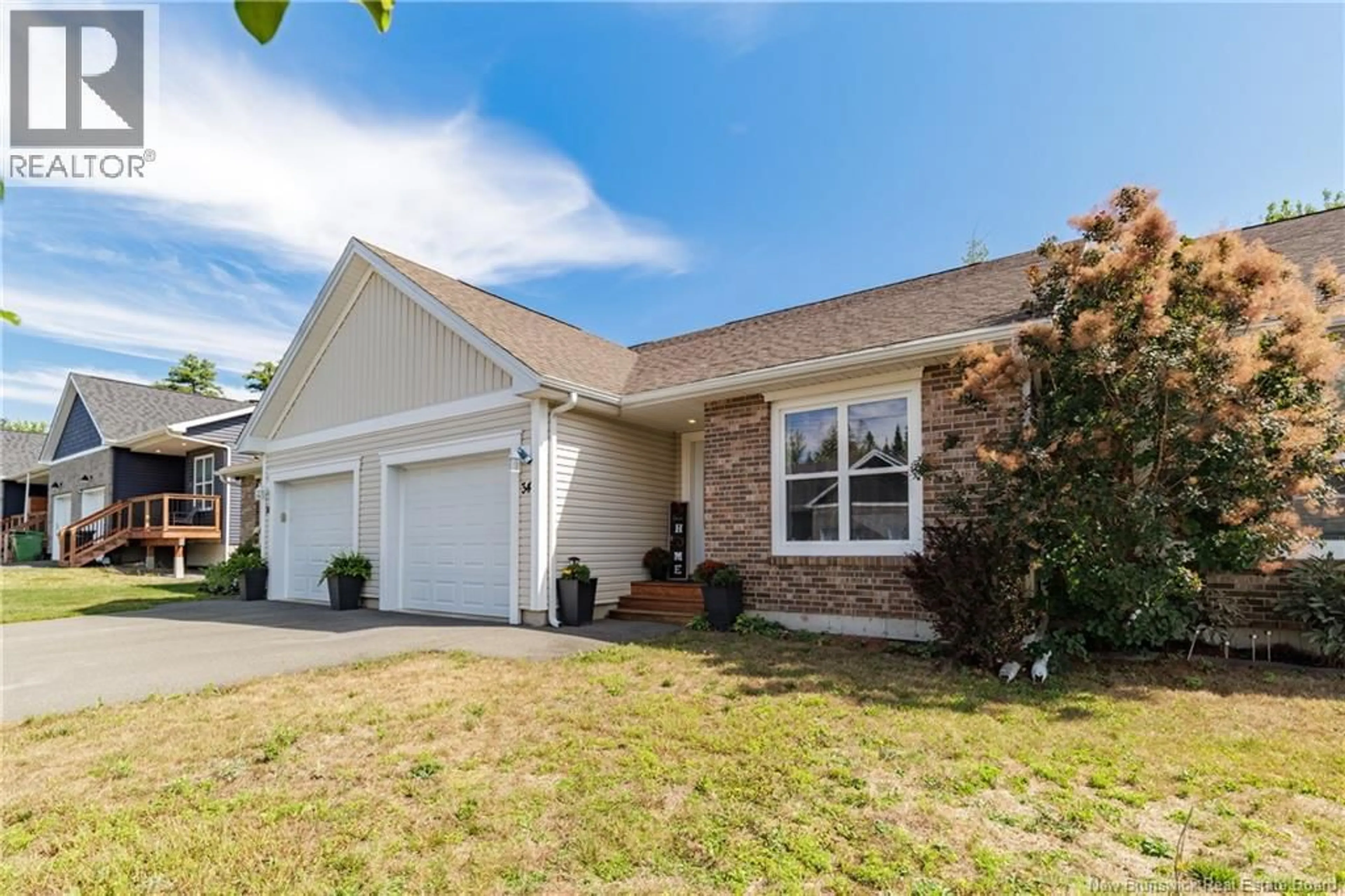 Home with vinyl exterior material, street for 34 CARDING WAY, Fredericton New Brunswick E3A5X5