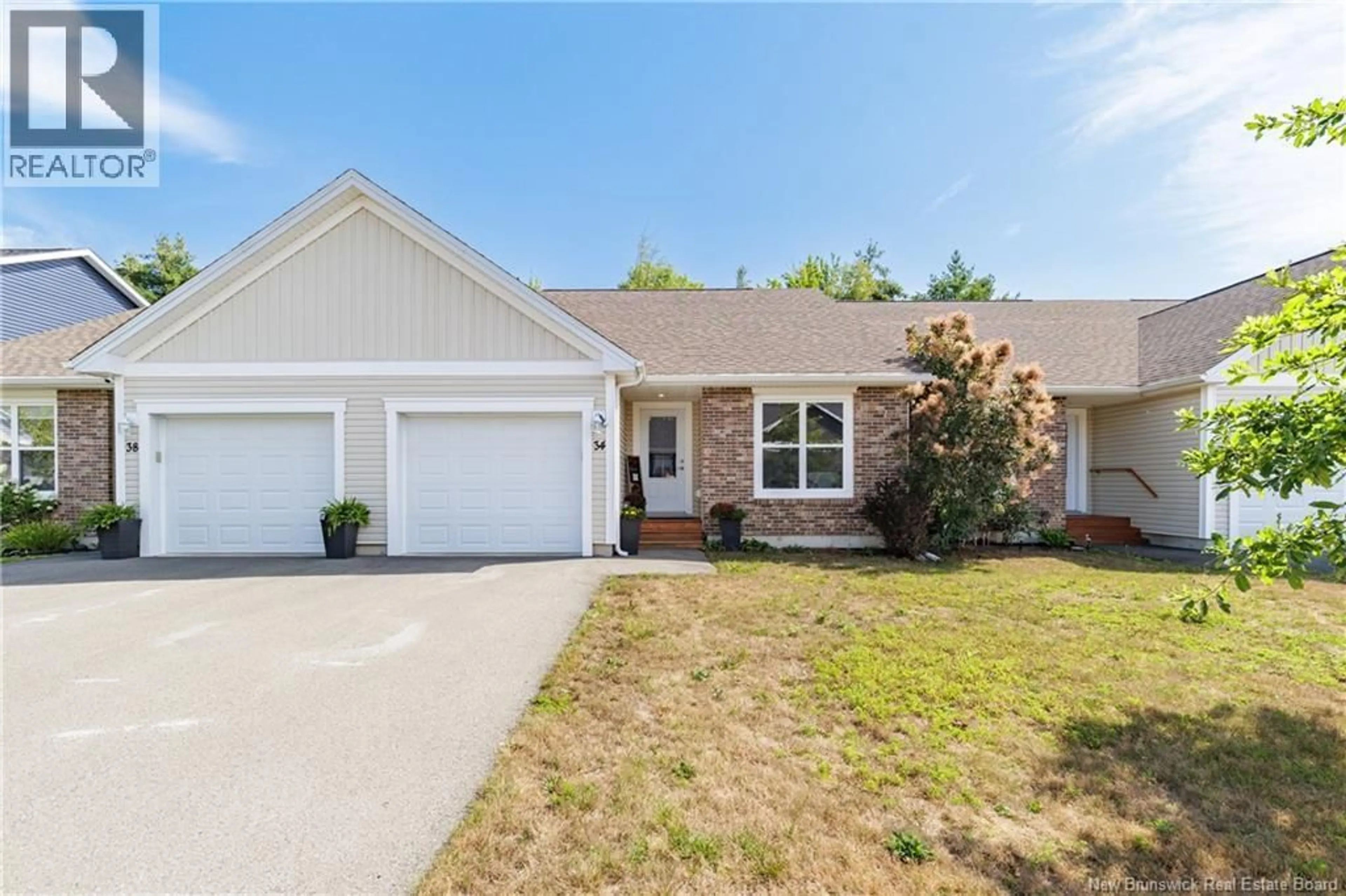 Home with vinyl exterior material, street for 34 CARDING WAY, Fredericton New Brunswick E3A5X5