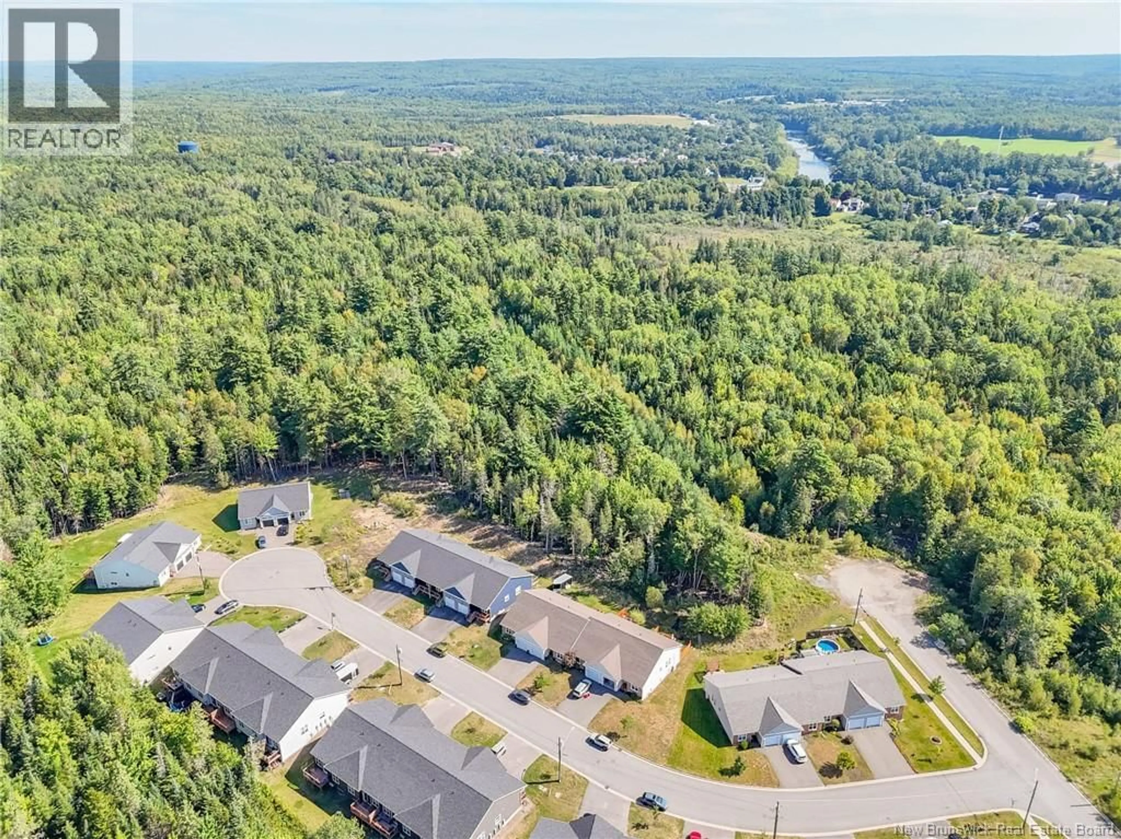 A pic from outside/outdoor area/front of a property/back of a property/a pic from drone, water/lake/river/ocean view for 34 CARDING WAY, Fredericton New Brunswick E3A5X5