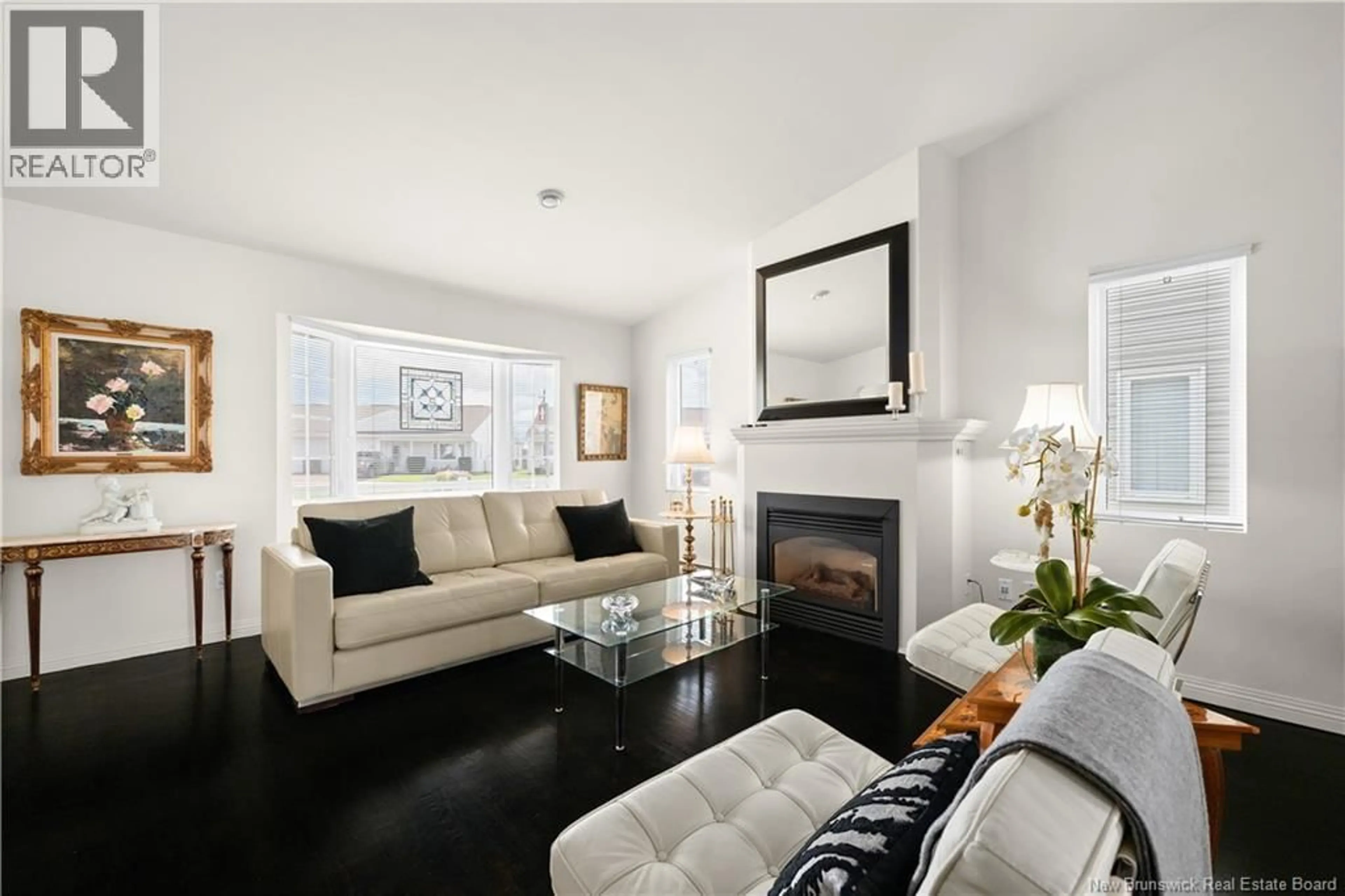 Living room with furniture, wood/laminate floor for 181 - 268 ACADIE AVENUE, Dieppe New Brunswick E1A6T2