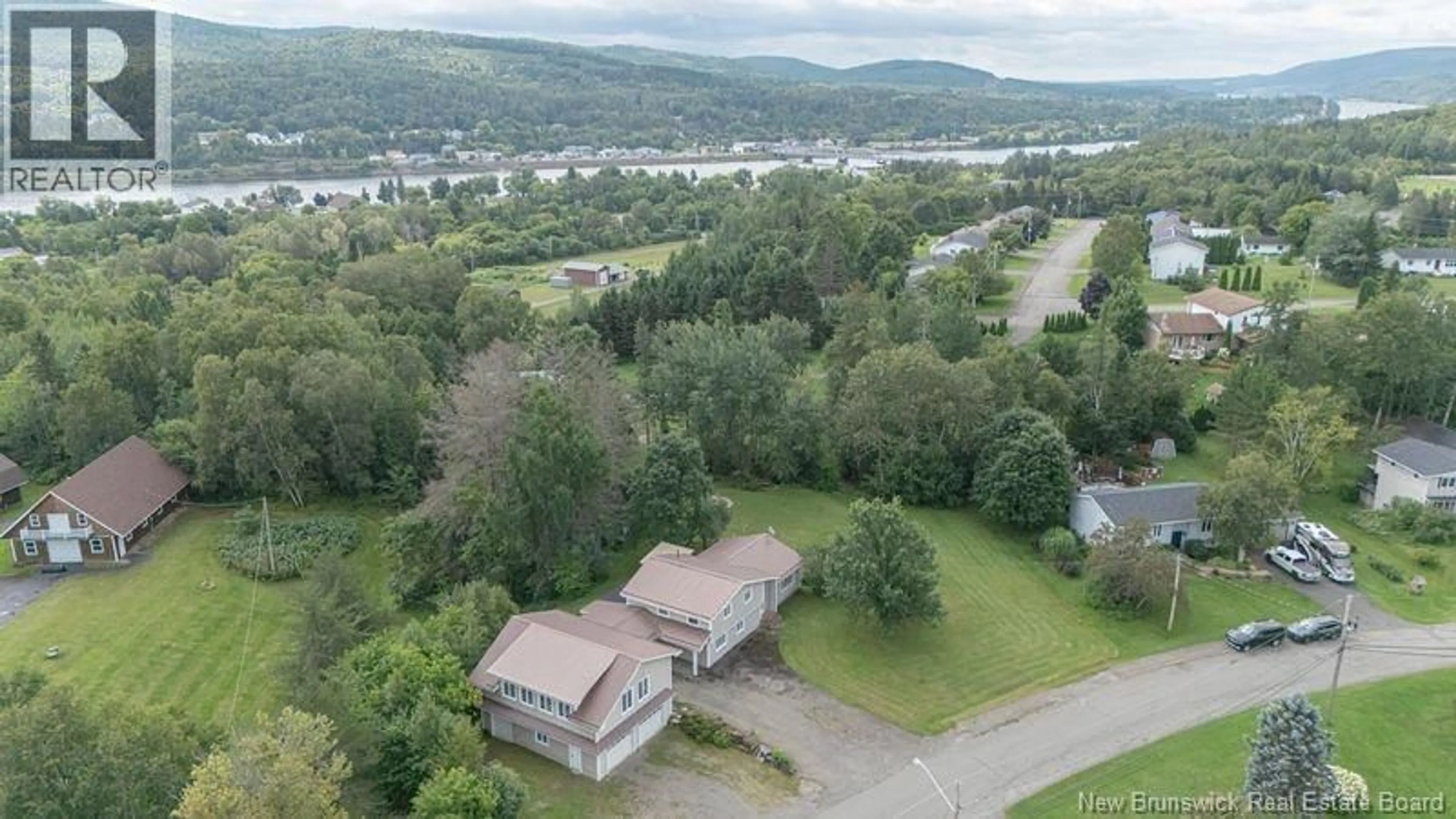 A pic from outside/outdoor area/front of a property/back of a property/a pic from drone, water/lake/river/ocean view for 51 HILLCREST DRIVE, Perth-Andover New Brunswick E7H2G7