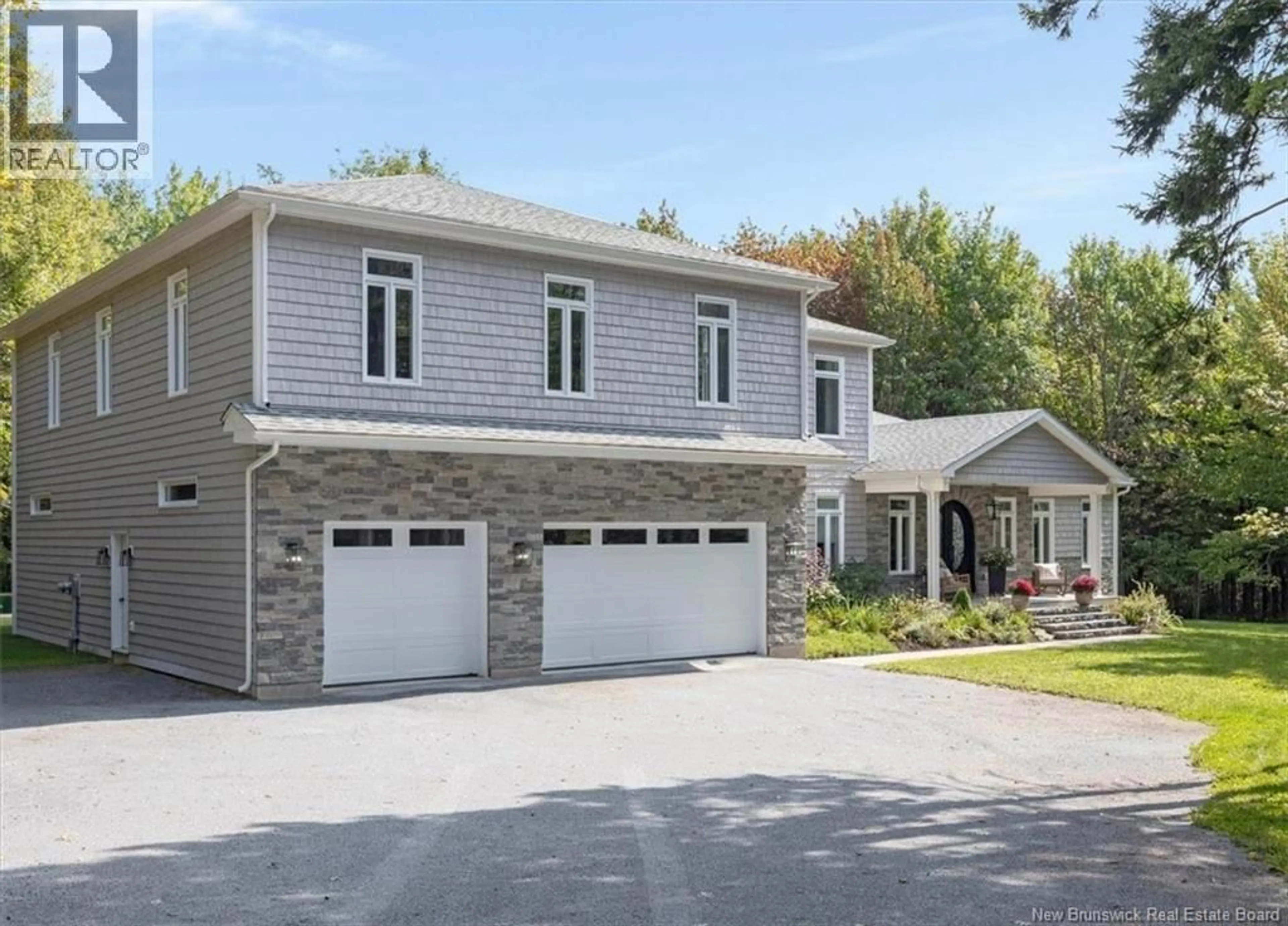 Home with vinyl exterior material, street for 5 BONNEYCASTLE LANE, Rothesay New Brunswick E2E5Y1