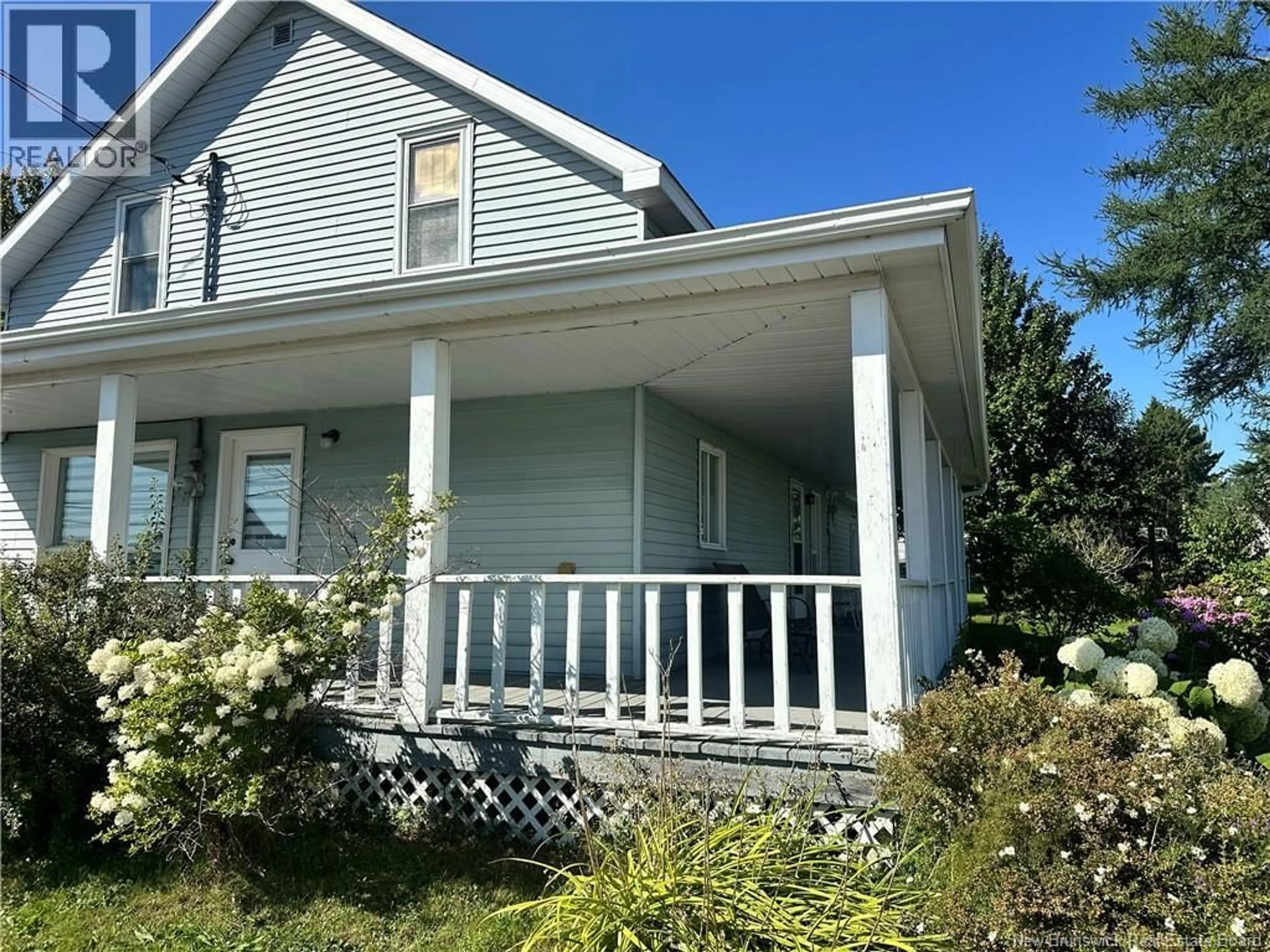 Home with vinyl exterior material, street for 76 ST-JEAN-BATISTE STREET, Kedgwick New Brunswick E8B1M2