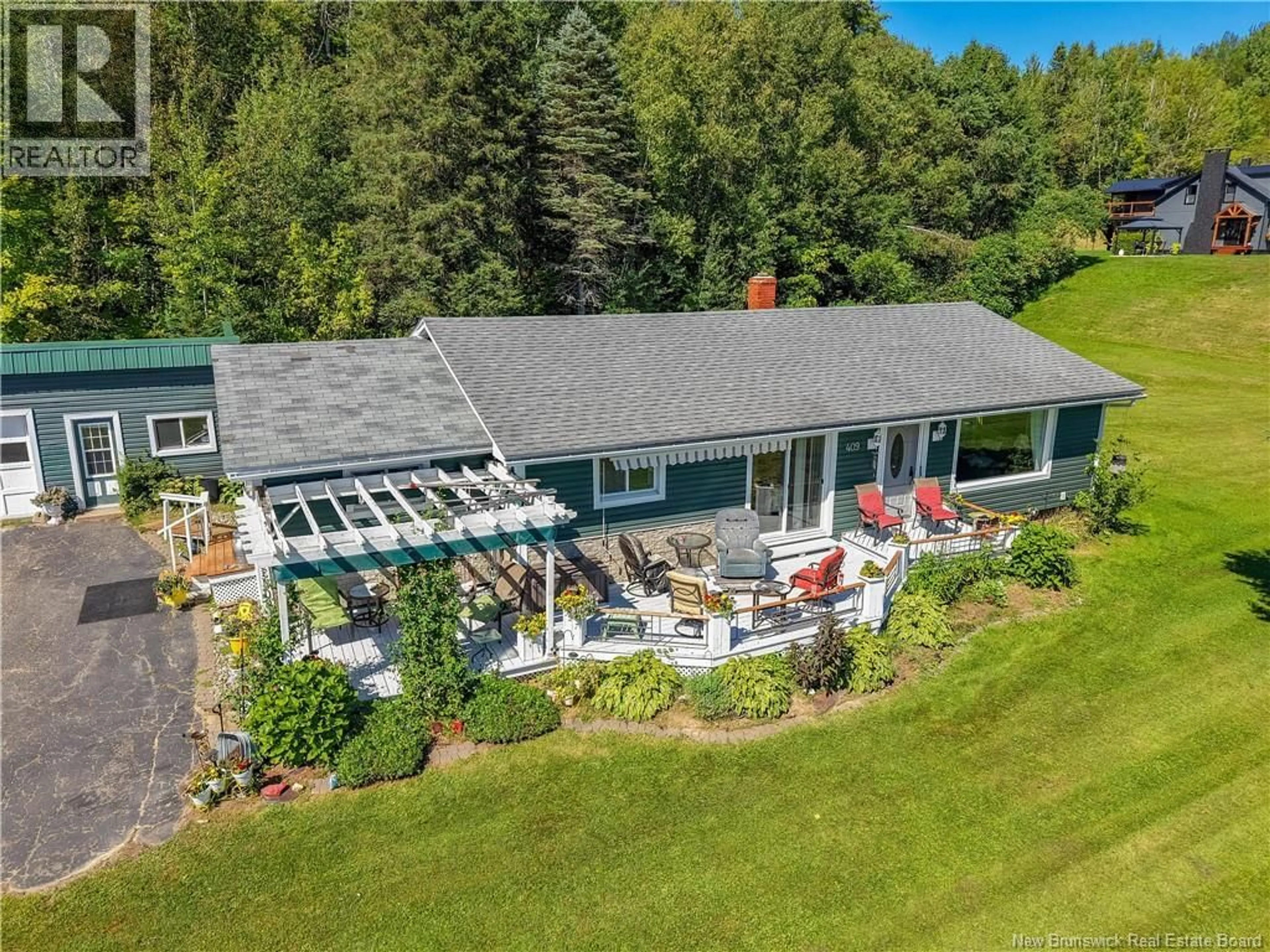 A pic from outside/outdoor area/front of a property/back of a property/a pic from drone, water/lake/river/ocean view for 409 OTIS DRIVE, Nackawic New Brunswick E6G1H5