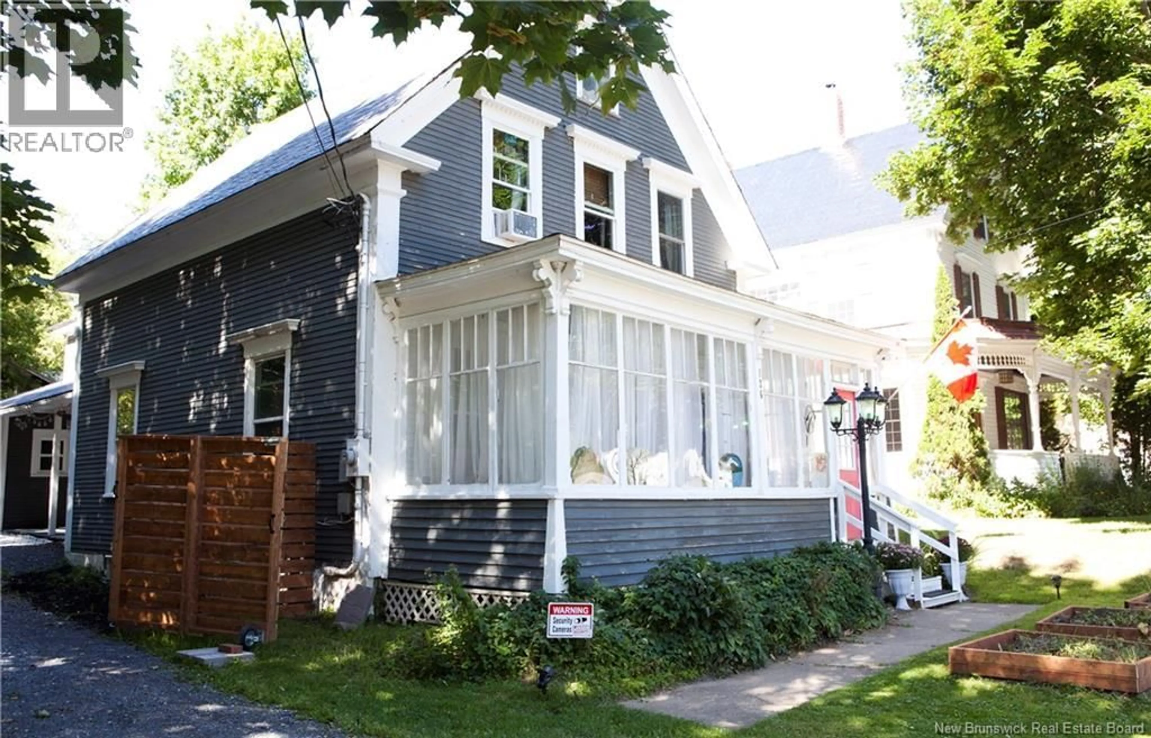 Home with vinyl exterior material, street for 126 BROADWAY STREET, Woodstock New Brunswick E7M1C2