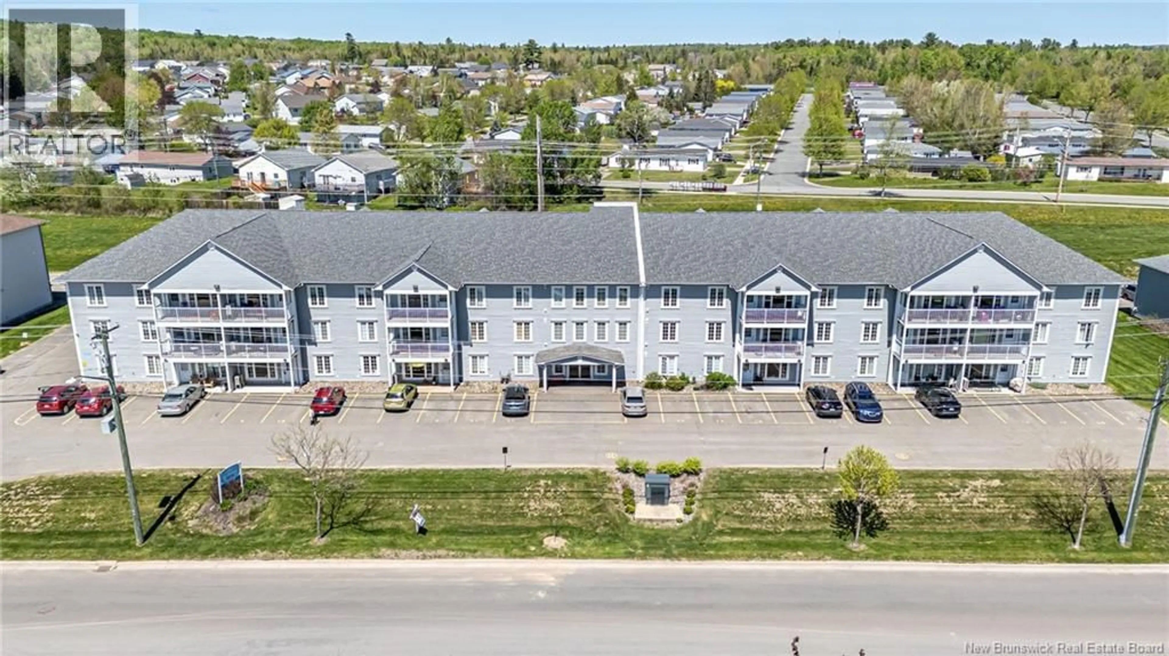 A pic from outside/outdoor area/front of a property/back of a property/a pic from drone, building for 33 - 185 REYNOLDS STREET, Fredericton New Brunswick E3A0K7