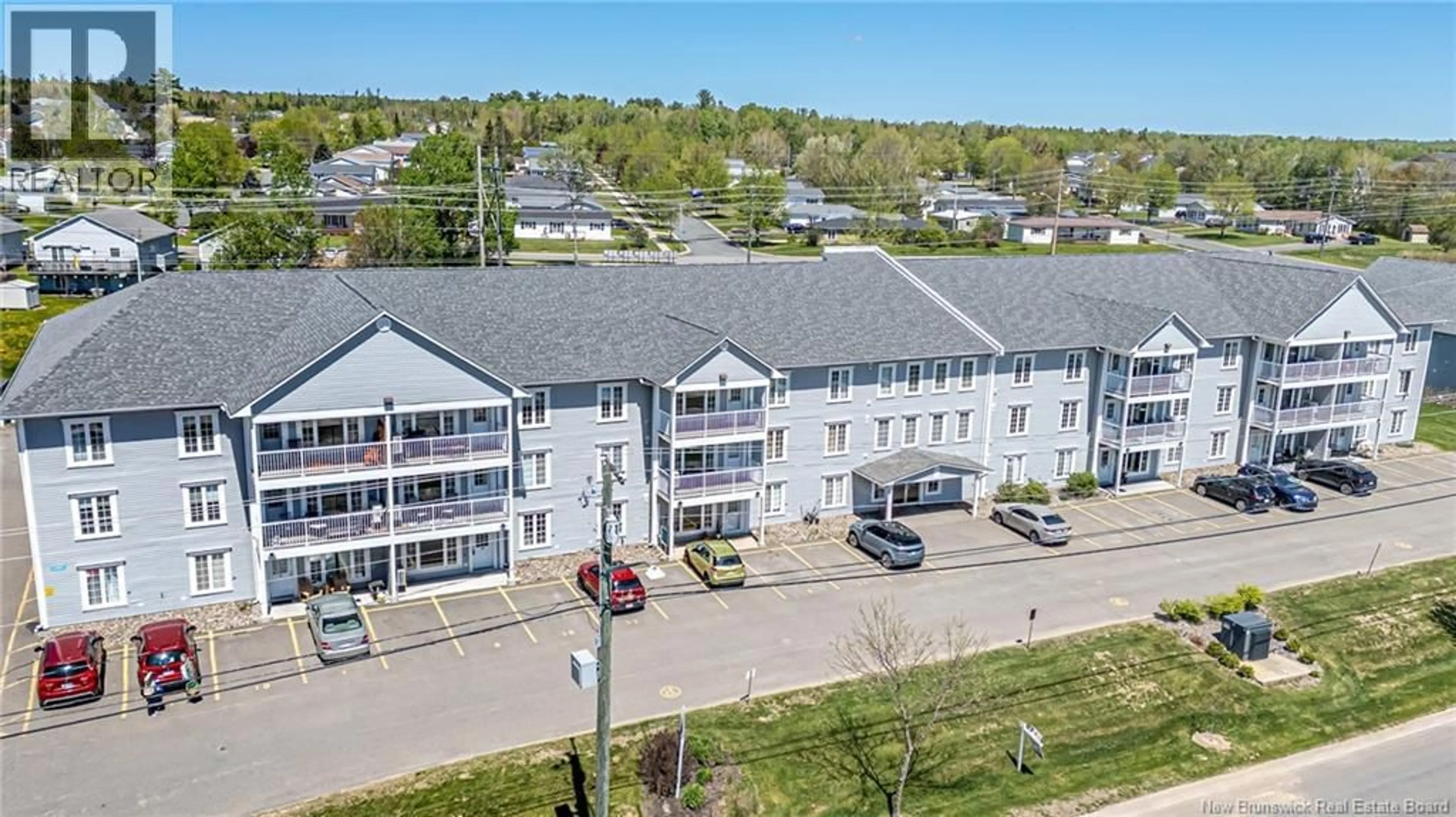 A pic from outside/outdoor area/front of a property/back of a property/a pic from drone, unknown for 33 - 185 REYNOLDS STREET, Fredericton New Brunswick E3A0K7