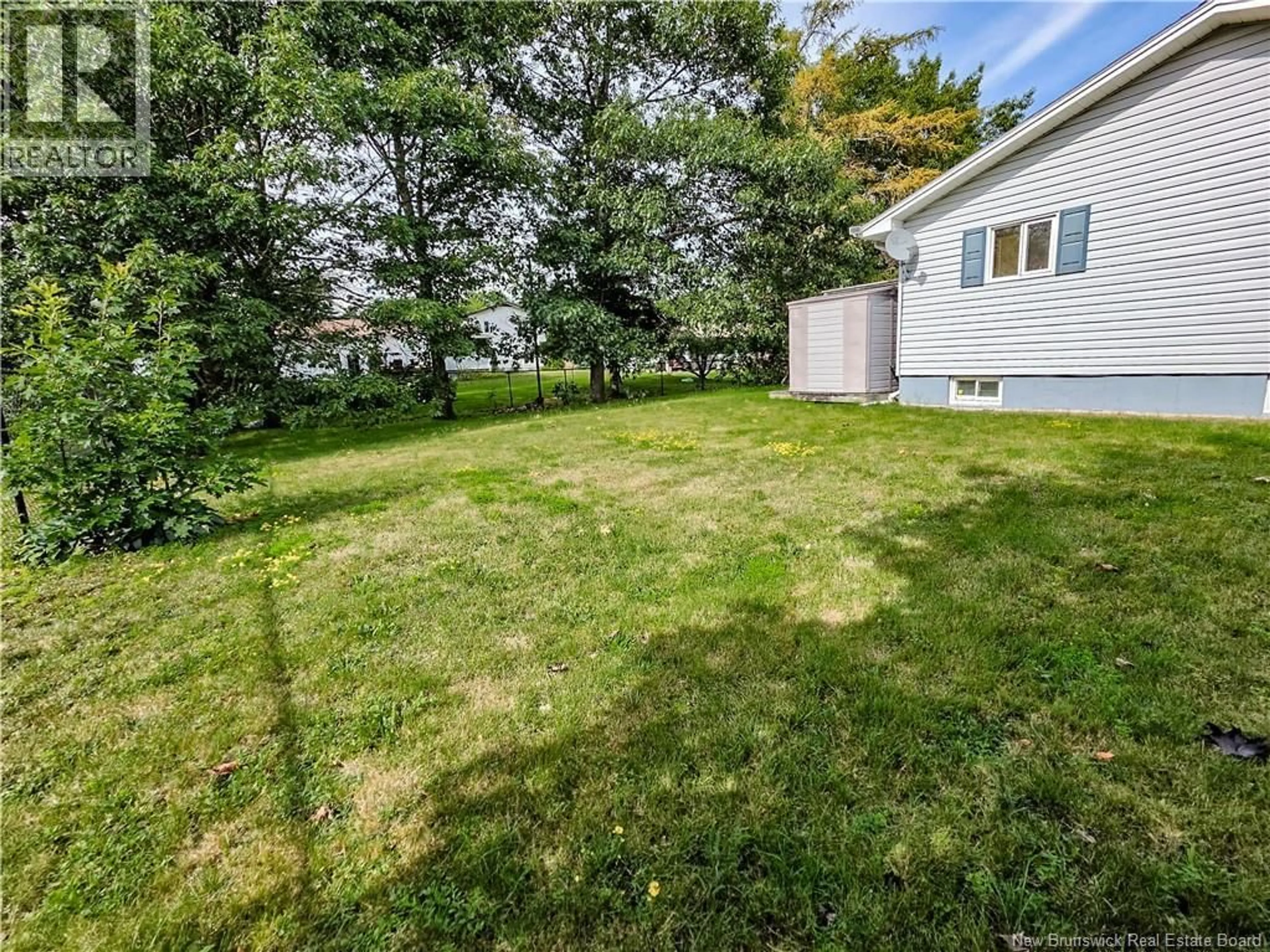A pic from outside/outdoor area/front of a property/back of a property/a pic from drone, water/lake/river/ocean view for 22 RANKINE, Richibucto New Brunswick E4W4G7