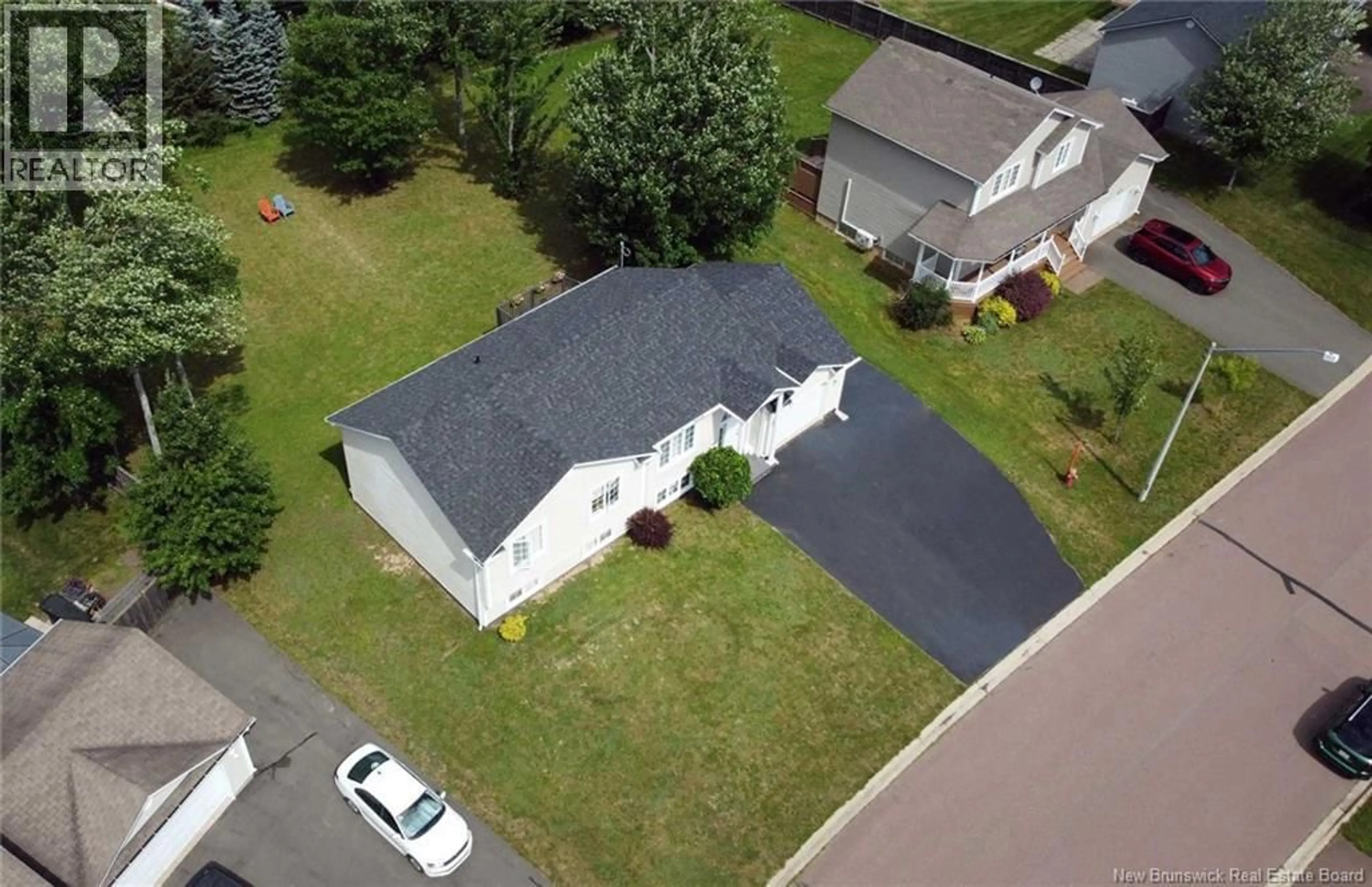A pic from outside/outdoor area/front of a property/back of a property/a pic from drone, street for 28 FAIRISLE DRIVE, Moncton New Brunswick E1G5J6