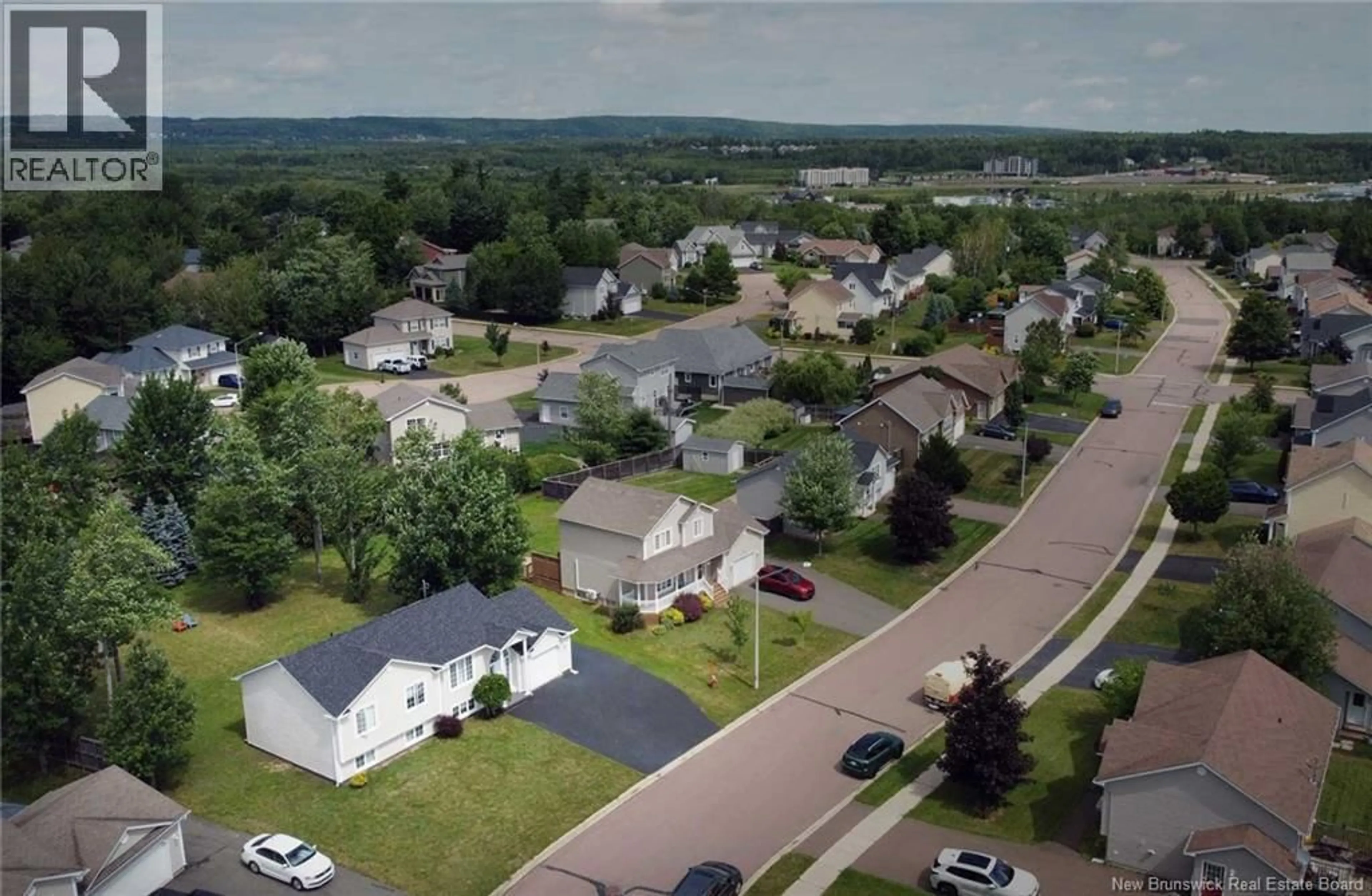 A pic from outside/outdoor area/front of a property/back of a property/a pic from drone, street for 28 FAIRISLE DRIVE, Moncton New Brunswick E1G5J6