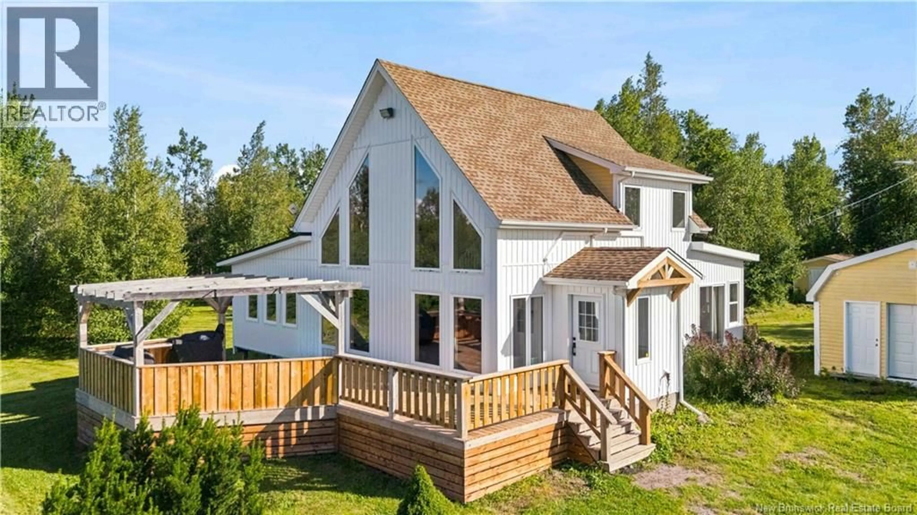 A pic from outside/outdoor area/front of a property/back of a property/a pic from drone, unknown for 133 COMEAU POINT ROAD, Shemogue New Brunswick E4N3B4