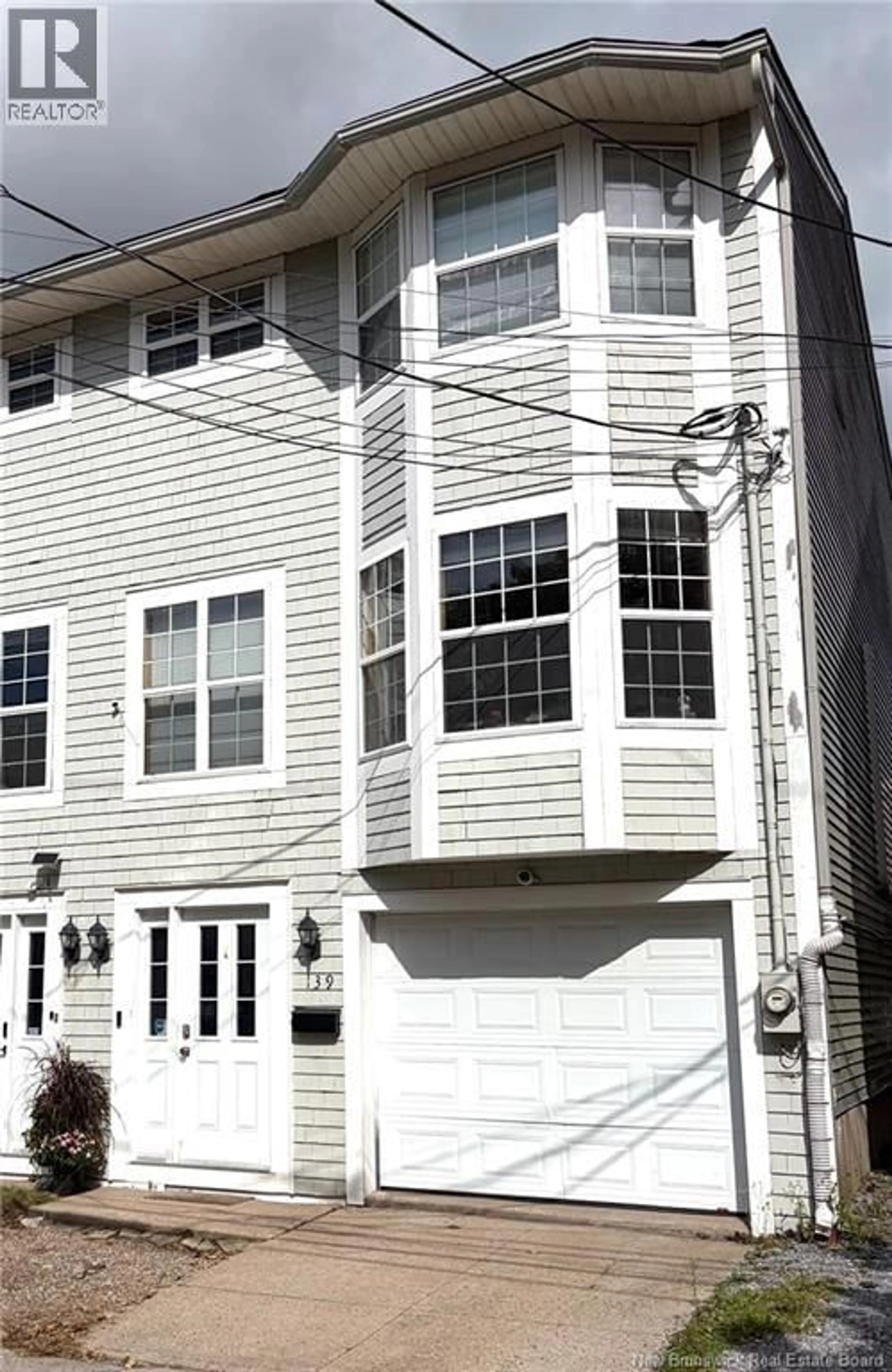 Home with vinyl exterior material, street for 139 KING STREET, Saint John New Brunswick E2L1G8