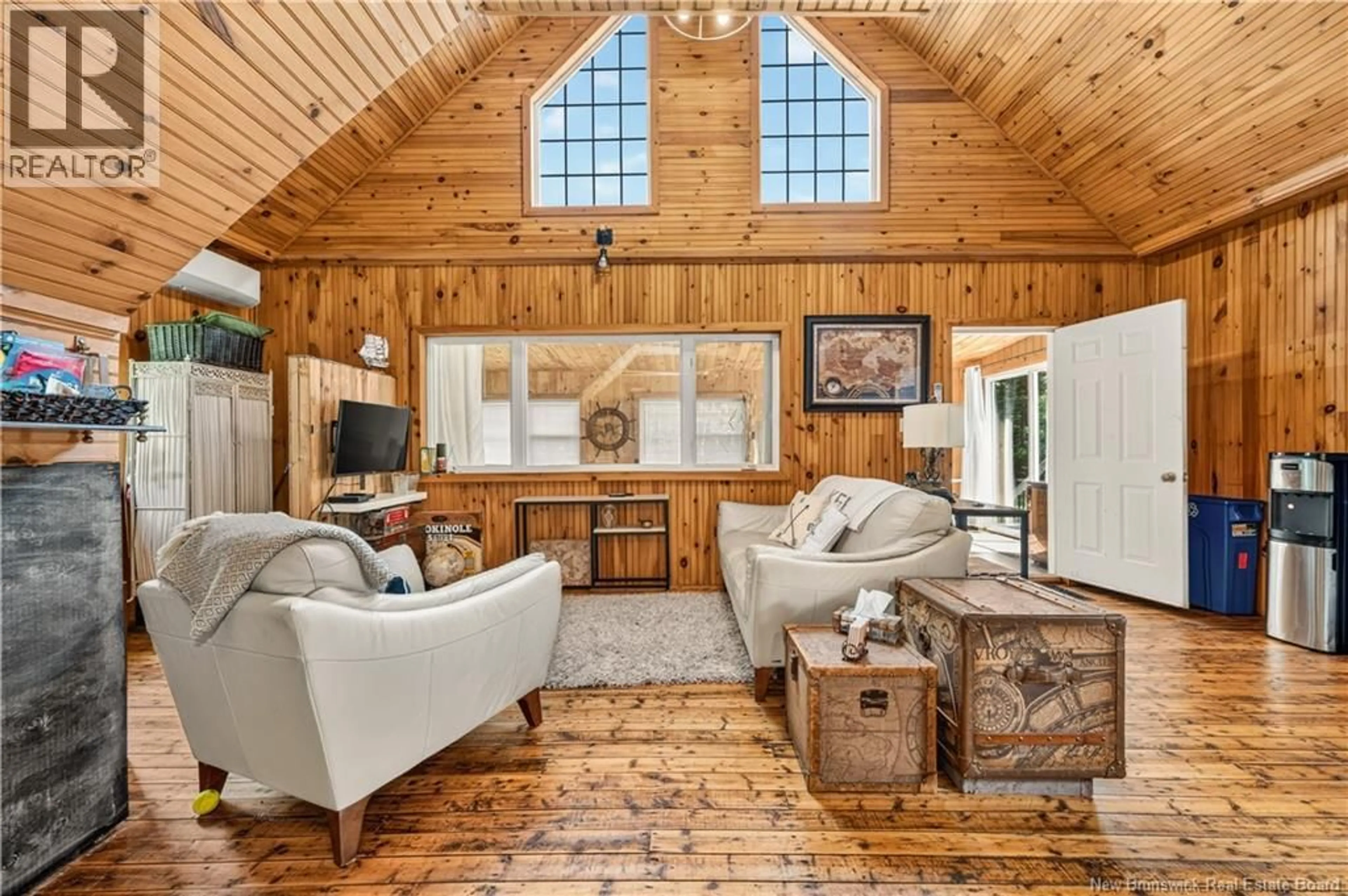 Living room with furniture, wood/laminate floor for 175 DAIGLE ROAD, Pointe-Sapin New Brunswick E1G2H4