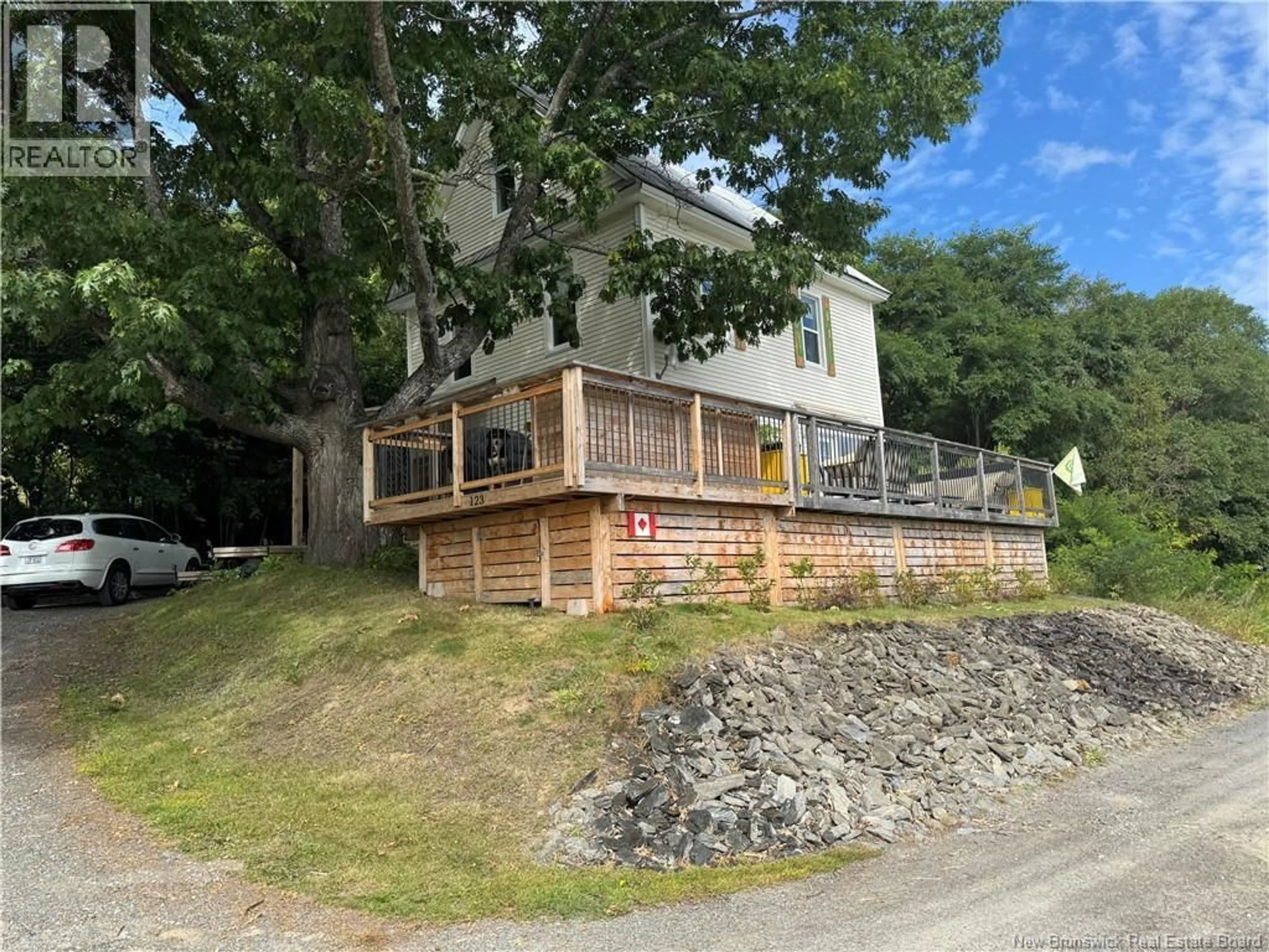 A pic from outside/outdoor area/front of a property/back of a property/a pic from drone, water/lake/river/ocean view for 123 BRIDGE STREET, Woodstock New Brunswick E7M5Y7