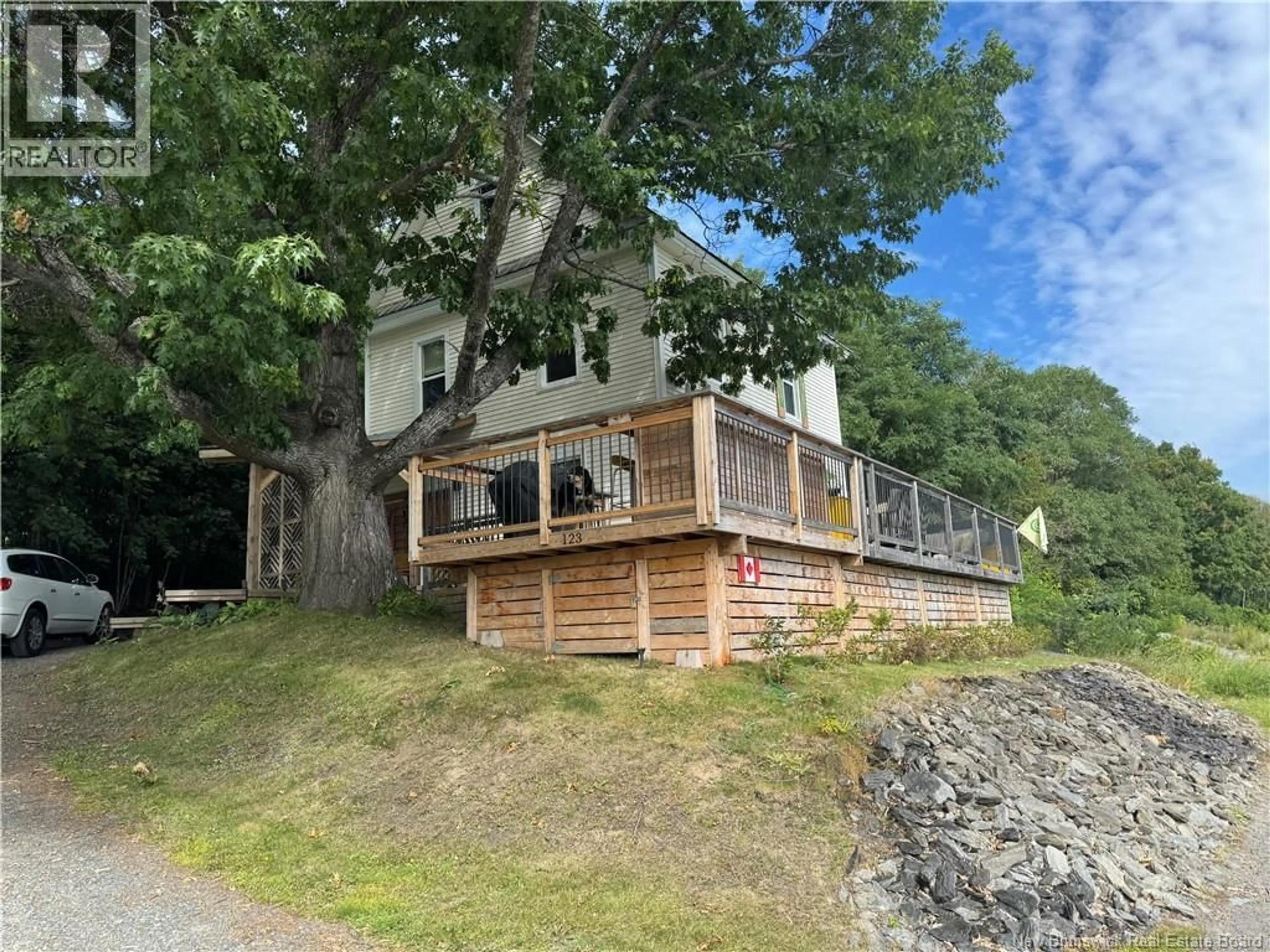 A pic from outside/outdoor area/front of a property/back of a property/a pic from drone, water/lake/river/ocean view for 123 BRIDGE STREET, Woodstock New Brunswick E7M5Y7
