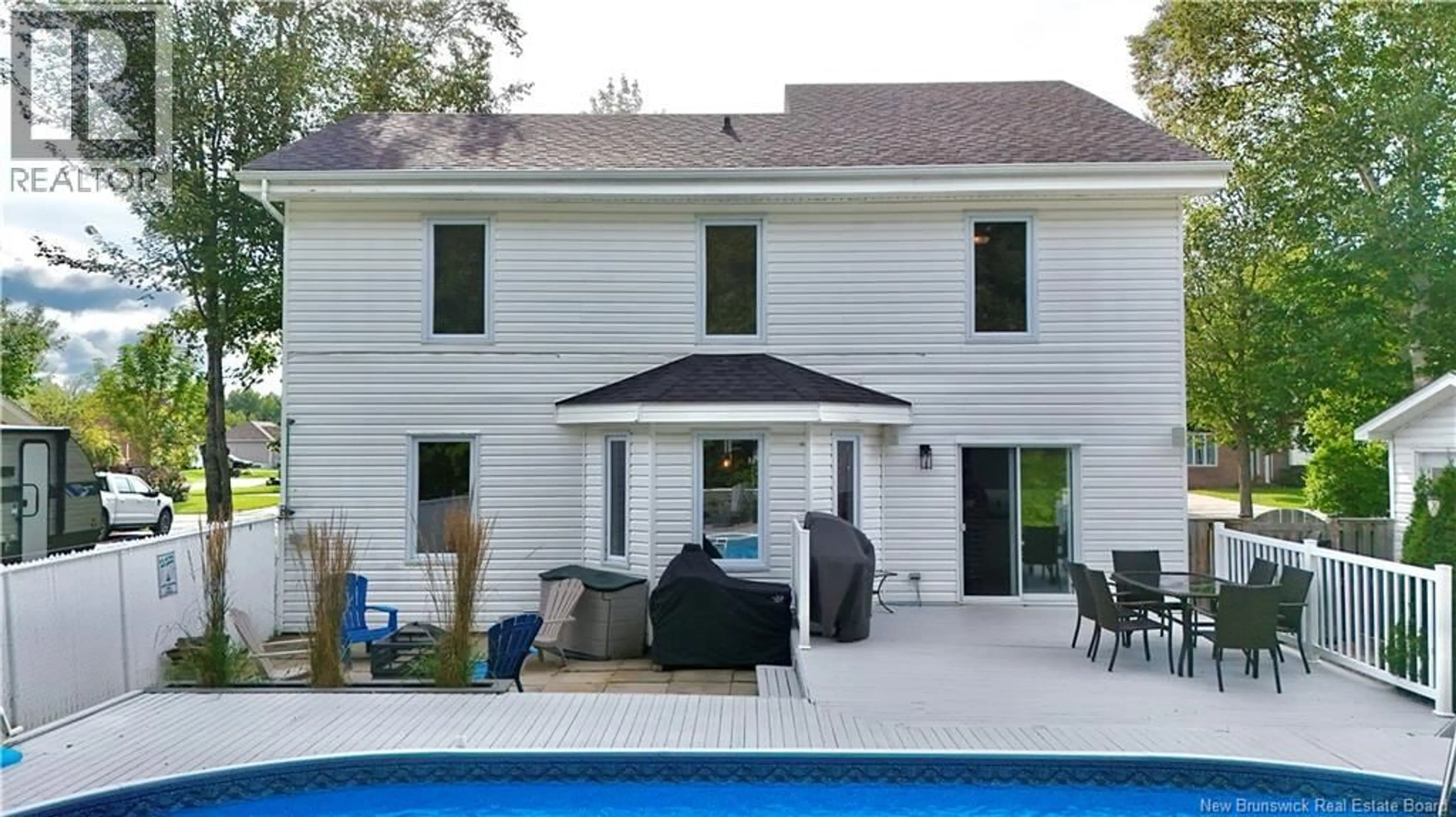Home with vinyl exterior material, street for 976 HUARDS, Beresford New Brunswick E8K1K4