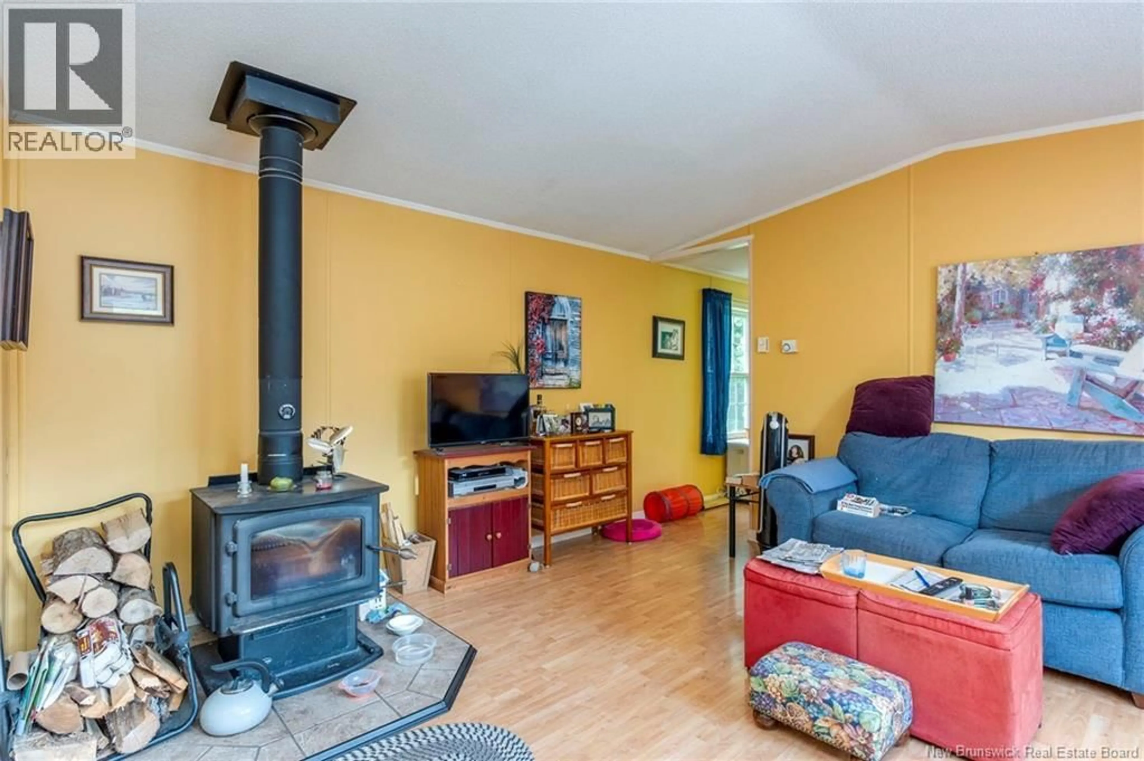 Living room with furniture, wood/laminate floor for 1 HOLLY STREET, Baxters Corner New Brunswick E2S2M9
