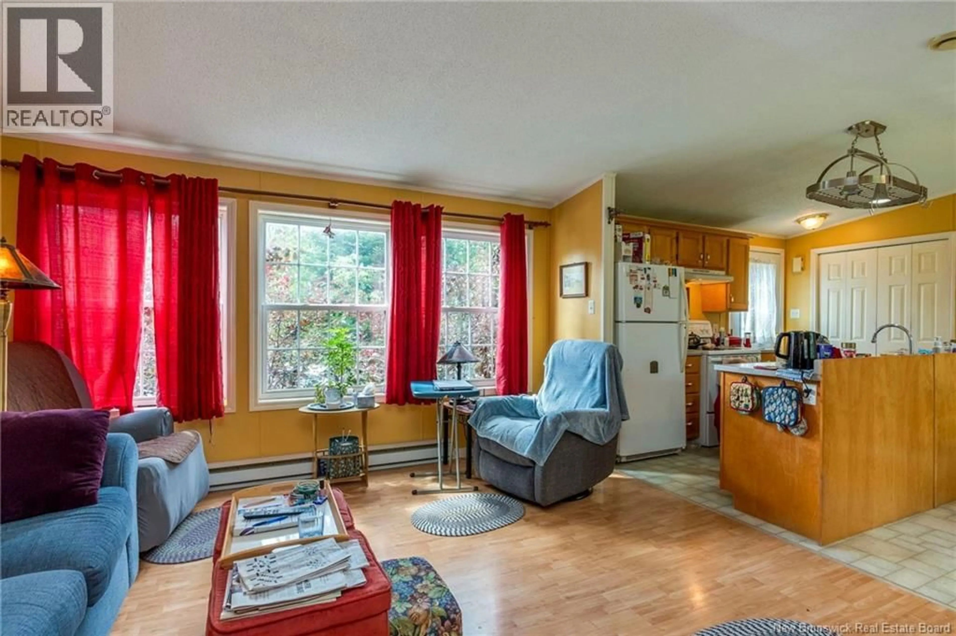 Living room with furniture, wood/laminate floor for 1 HOLLY STREET, Baxters Corner New Brunswick E2S2M9