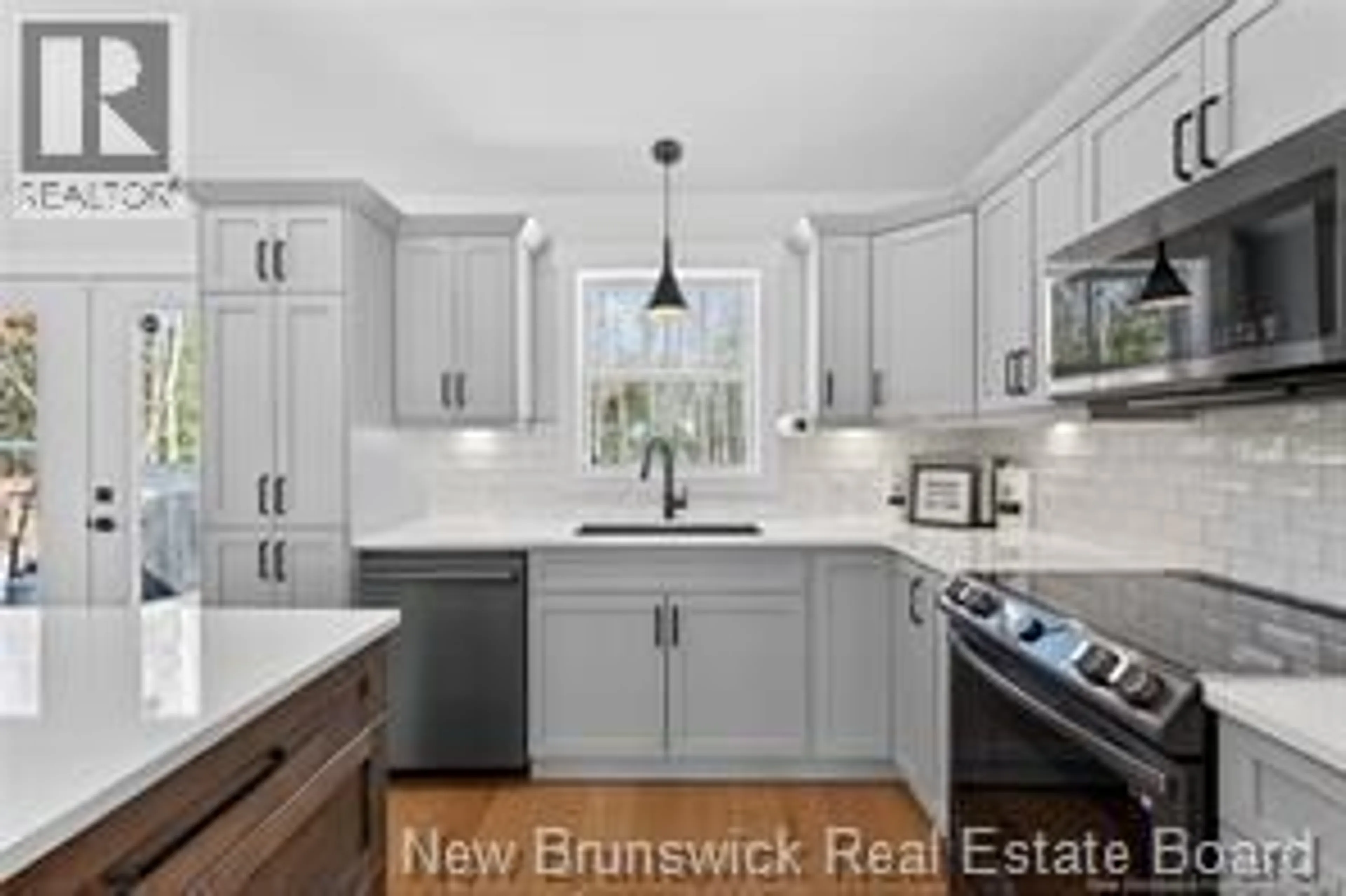 Open concept kitchen, wood/laminate floor for 12 BARBARA DRIVE, Rusagonis-Waasis New Brunswick E3B5G7