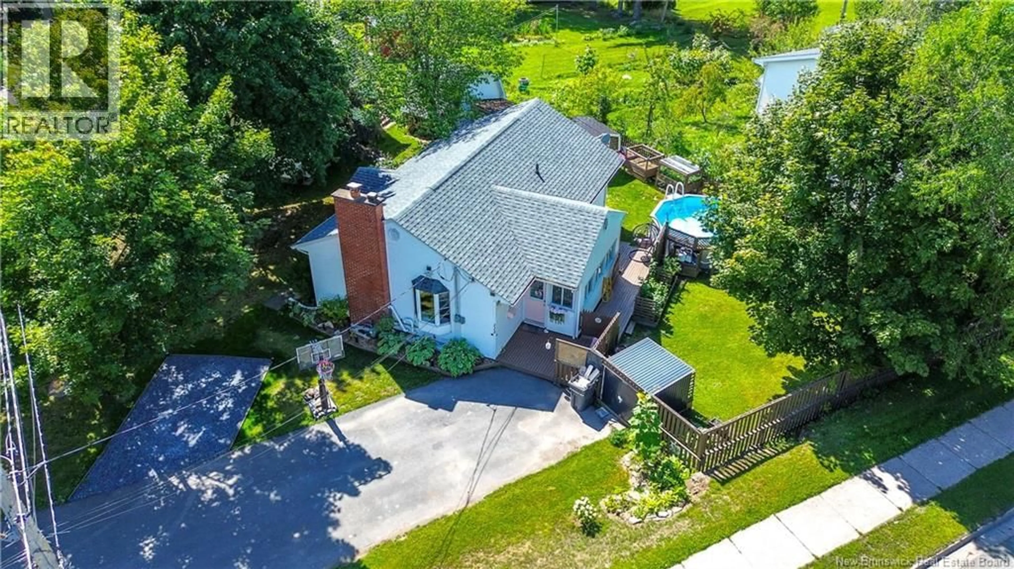 A pic from outside/outdoor area/front of a property/back of a property/a pic from drone, street for 113 FULTON AVENUE, Fredericton New Brunswick E3A2B5