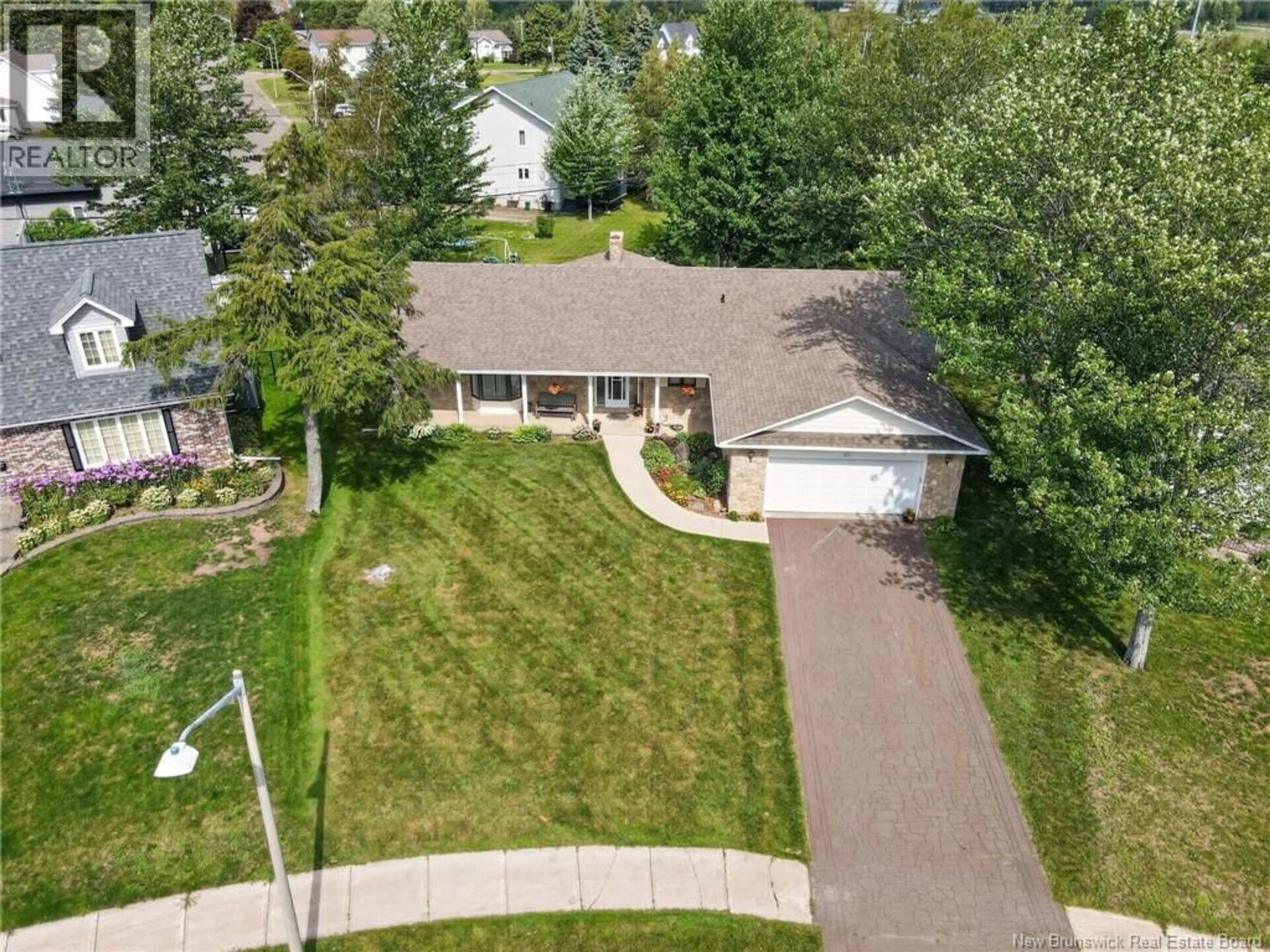 A pic from outside/outdoor area/front of a property/back of a property/a pic from drone, street for 67 TEAKWOOD WAY, Moncton New Brunswick E1G1T3