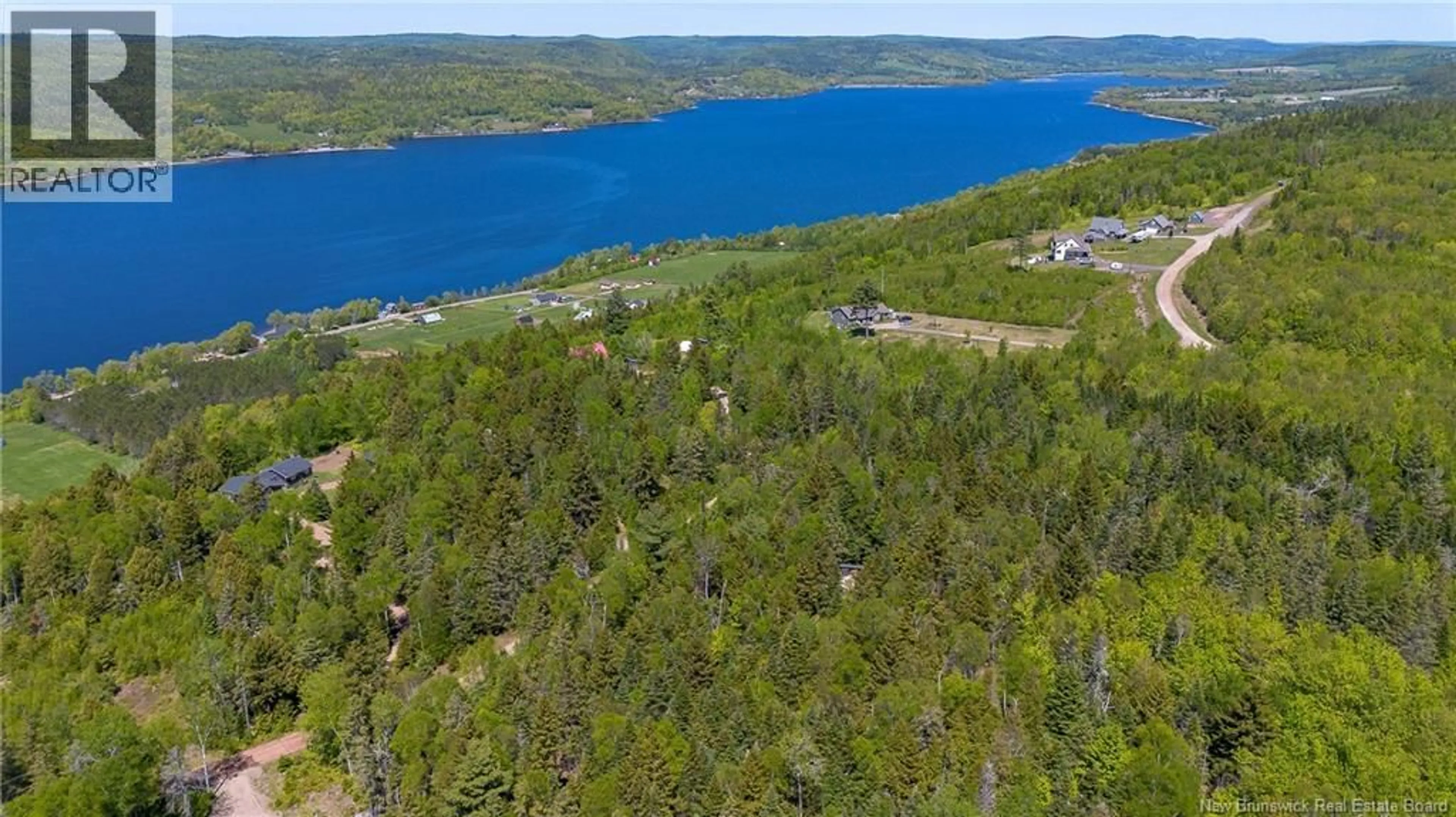 A pic from outside/outdoor area/front of a property/back of a property/a pic from drone, water/lake/river/ocean view for 25 BELL HILL ROAD, Long Point New Brunswick E5N7W5