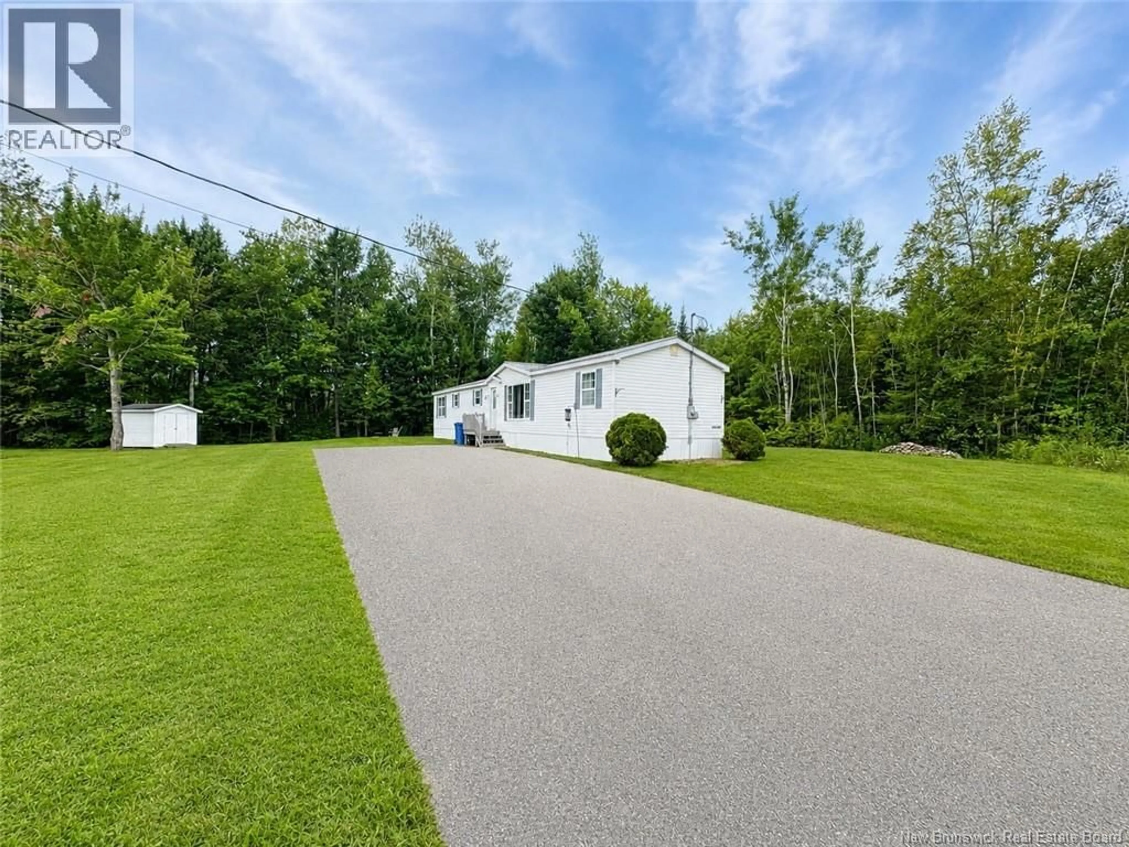 A pic from outside/outdoor area/front of a property/back of a property/a pic from drone, unknown for 15 SILVERWOOD, Miramichi New Brunswick E1V5Z1