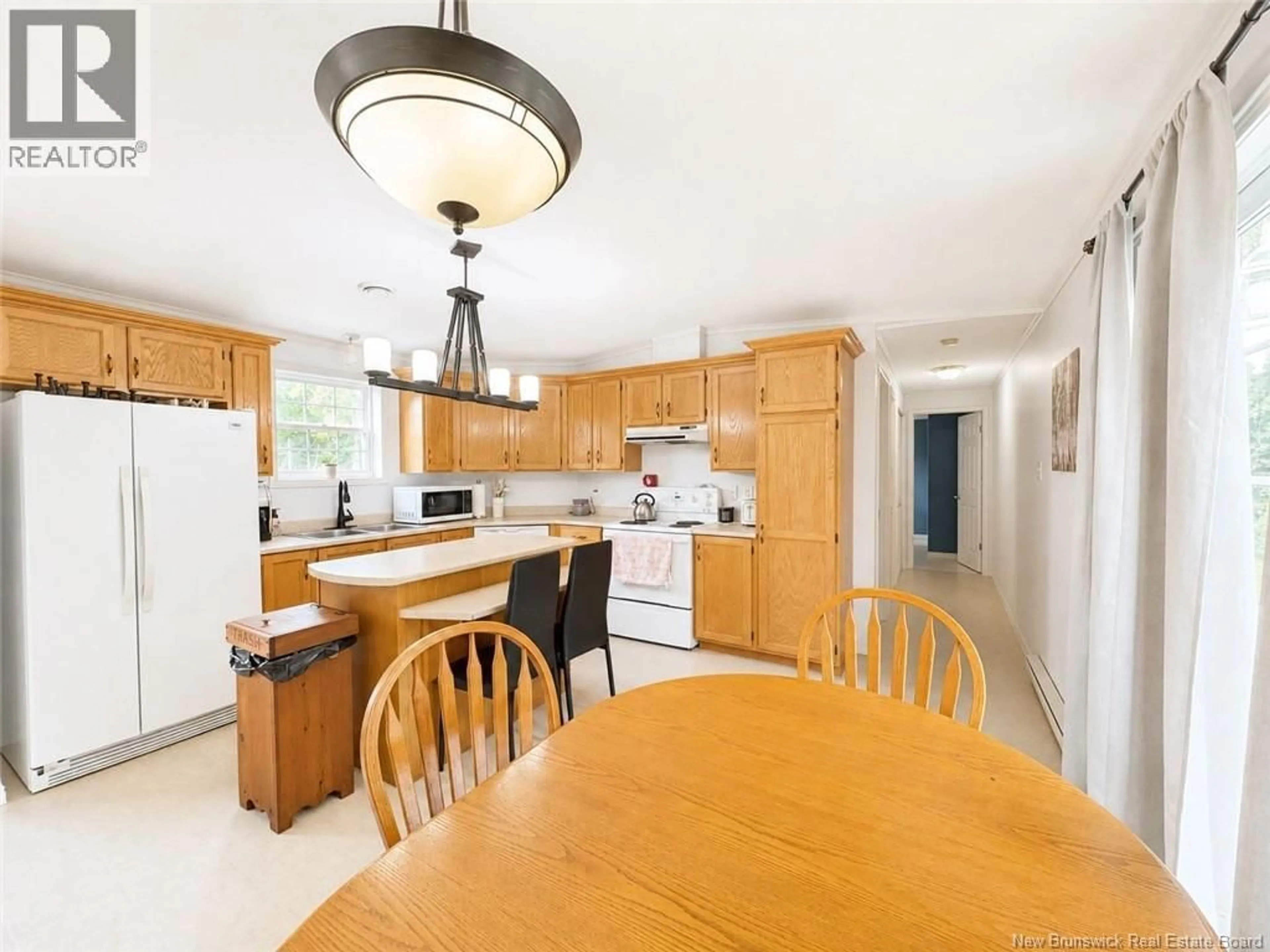 Open concept kitchen, ceramic/tile floor for 15 SILVERWOOD, Miramichi New Brunswick E1V5Z1