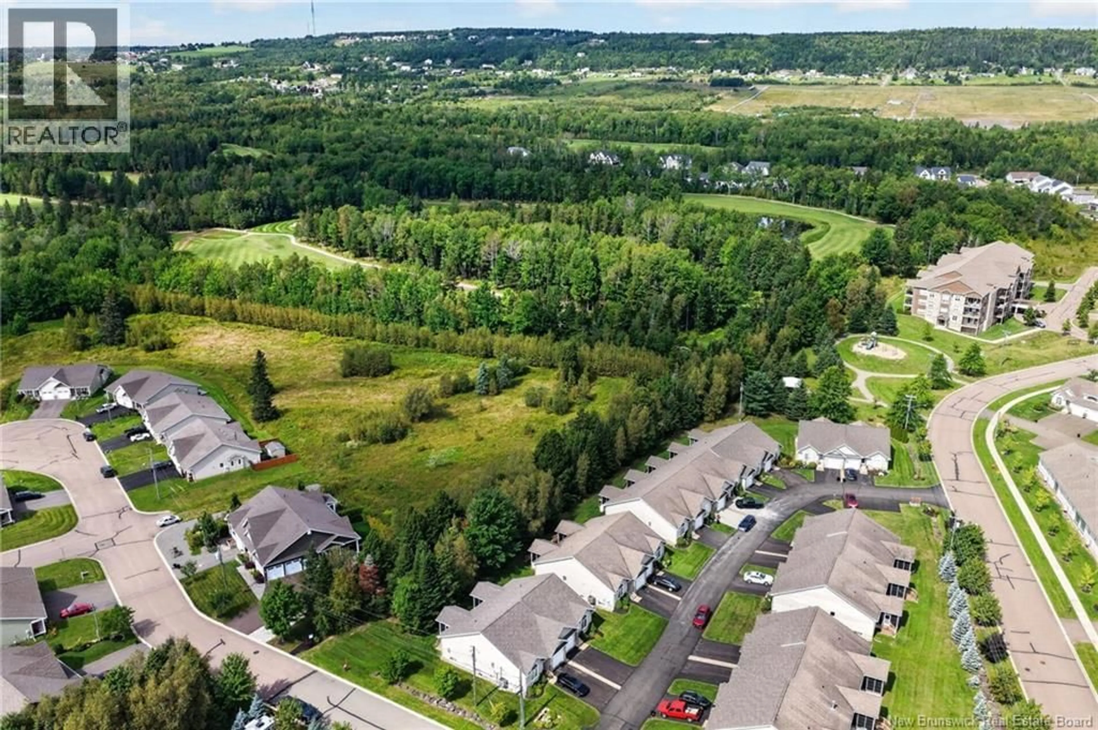 A pic from outside/outdoor area/front of a property/back of a property/a pic from drone, unknown for 4 ROCKLEY LANE, Moncton New Brunswick E1G0C5