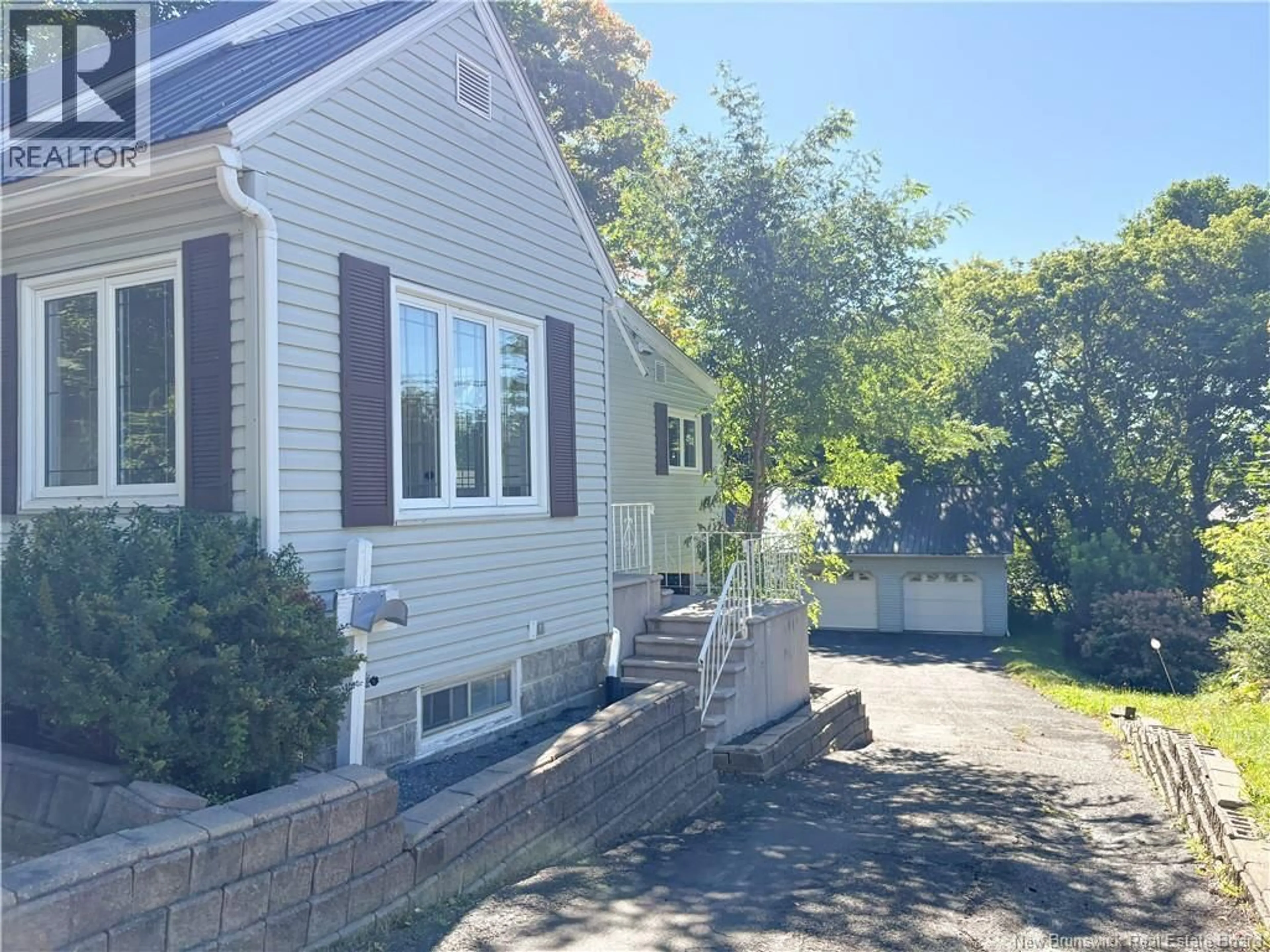 Home with vinyl exterior material, street for 161 UNION STREET, Woodstock New Brunswick E7M2W6