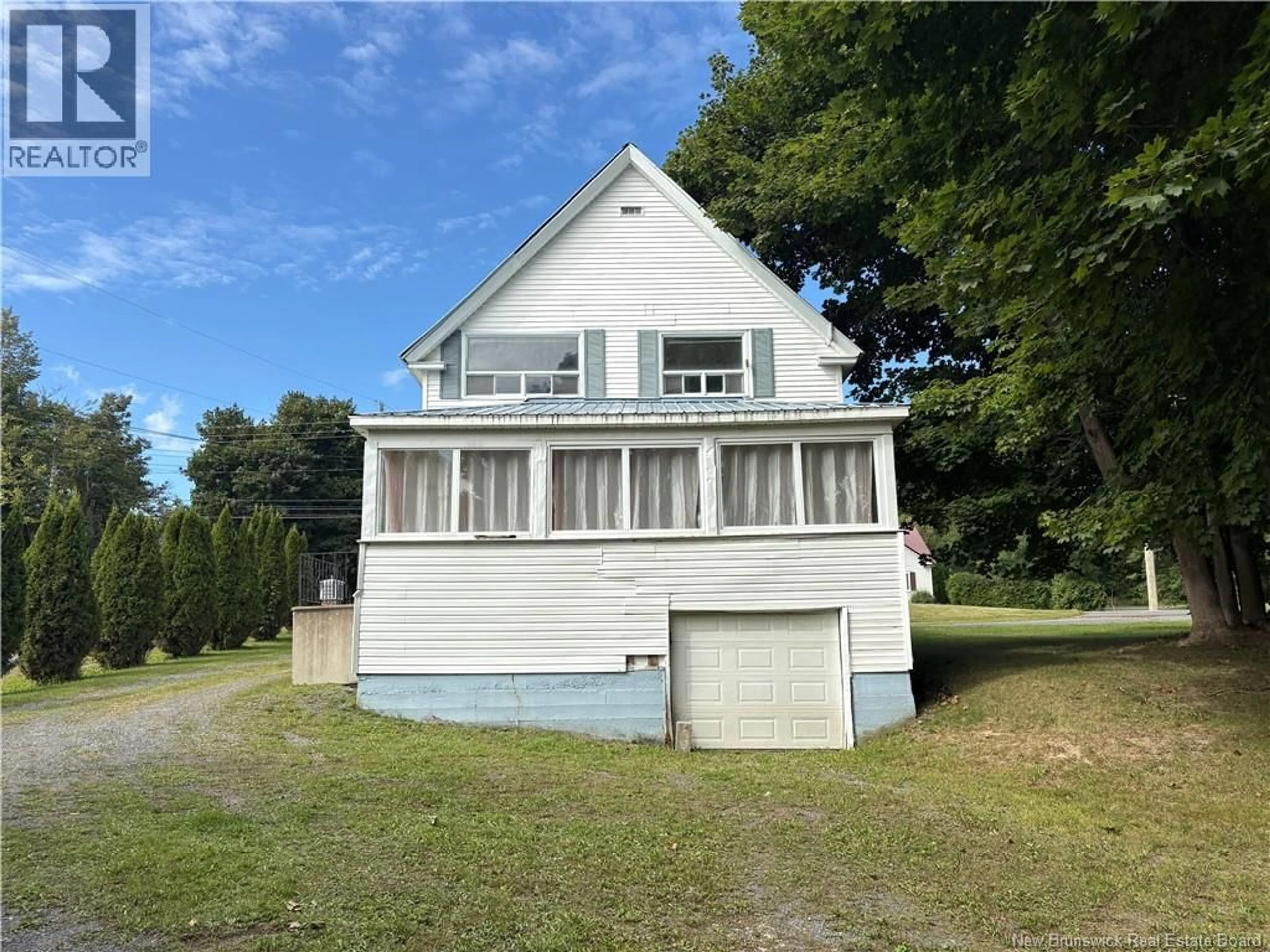 A pic from outside/outdoor area/front of a property/back of a property/a pic from drone, water/lake/river/ocean view for 806 MAIN STREET, Woodstock New Brunswick E7M2E8