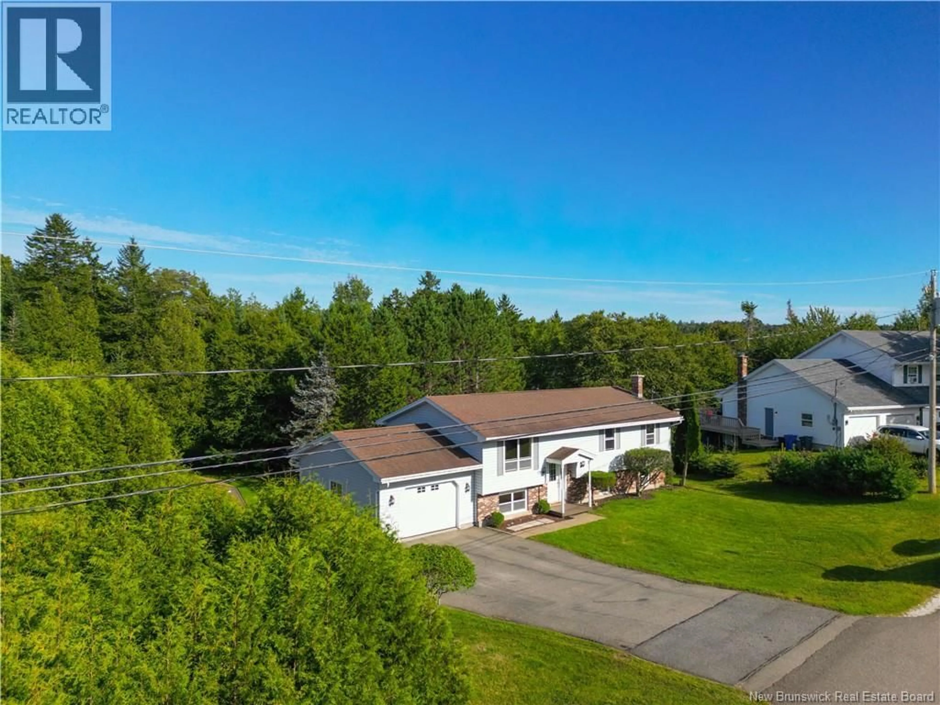 A pic from outside/outdoor area/front of a property/back of a property/a pic from drone, unknown for 13 JASPER DRIVE, Quispamsis New Brunswick E2E4Y3