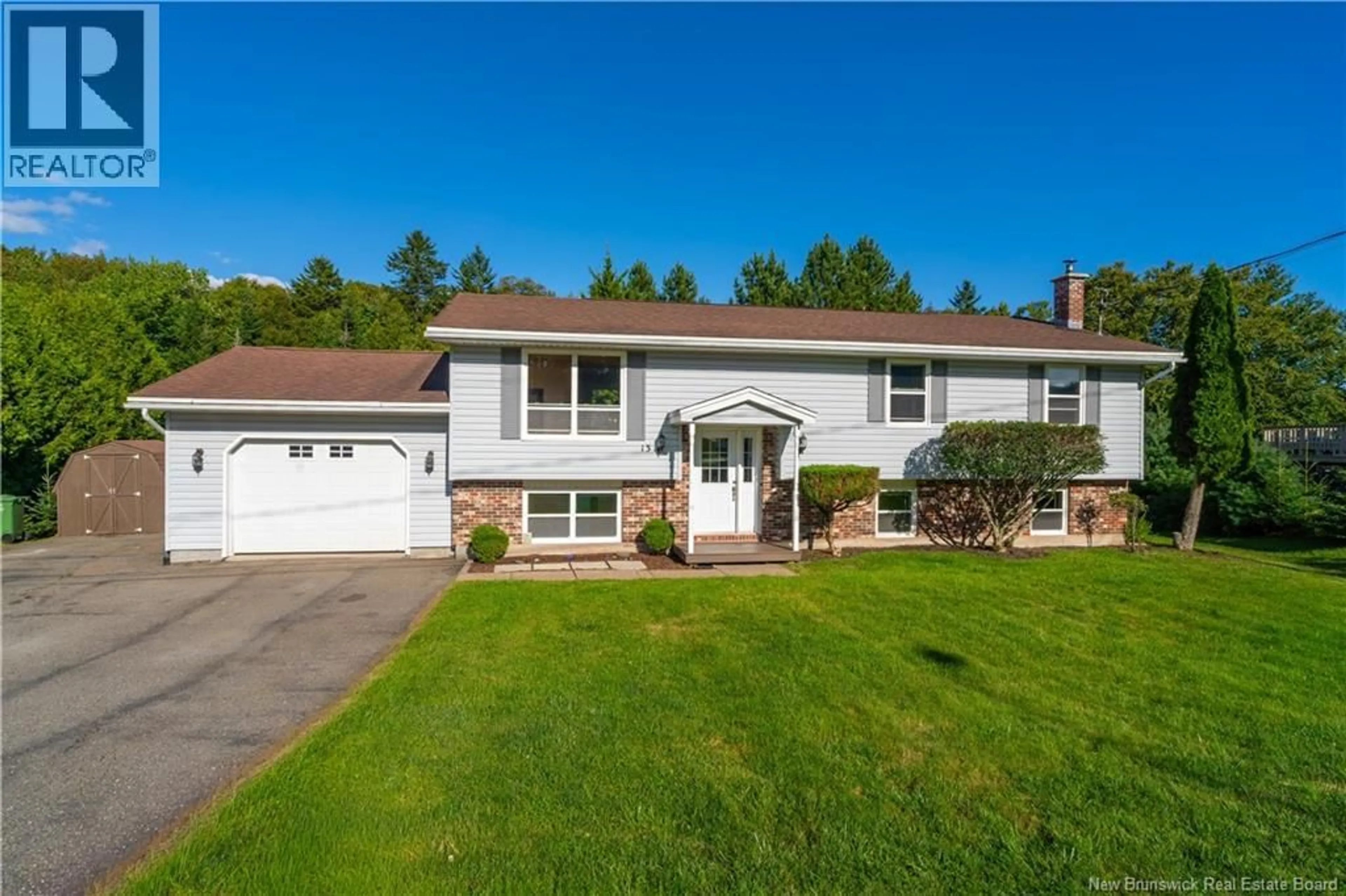 Home with vinyl exterior material, street for 13 JASPER DRIVE, Quispamsis New Brunswick E2E4Y3