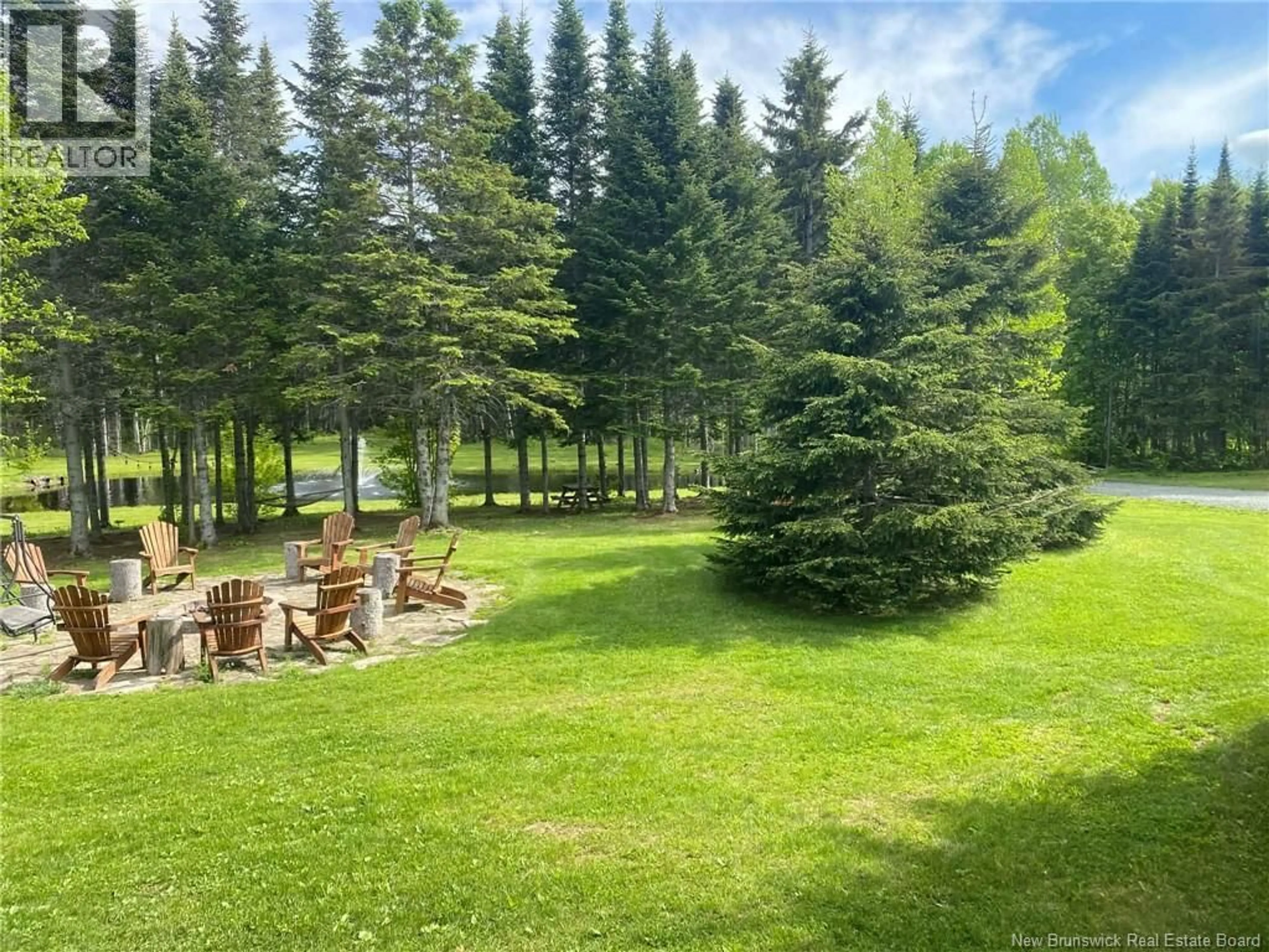 A pic from outside/outdoor area/front of a property/back of a property/a pic from drone, forest/trees view for 4481 ROUTE 180, South Tetagouche New Brunswick E2A7G8